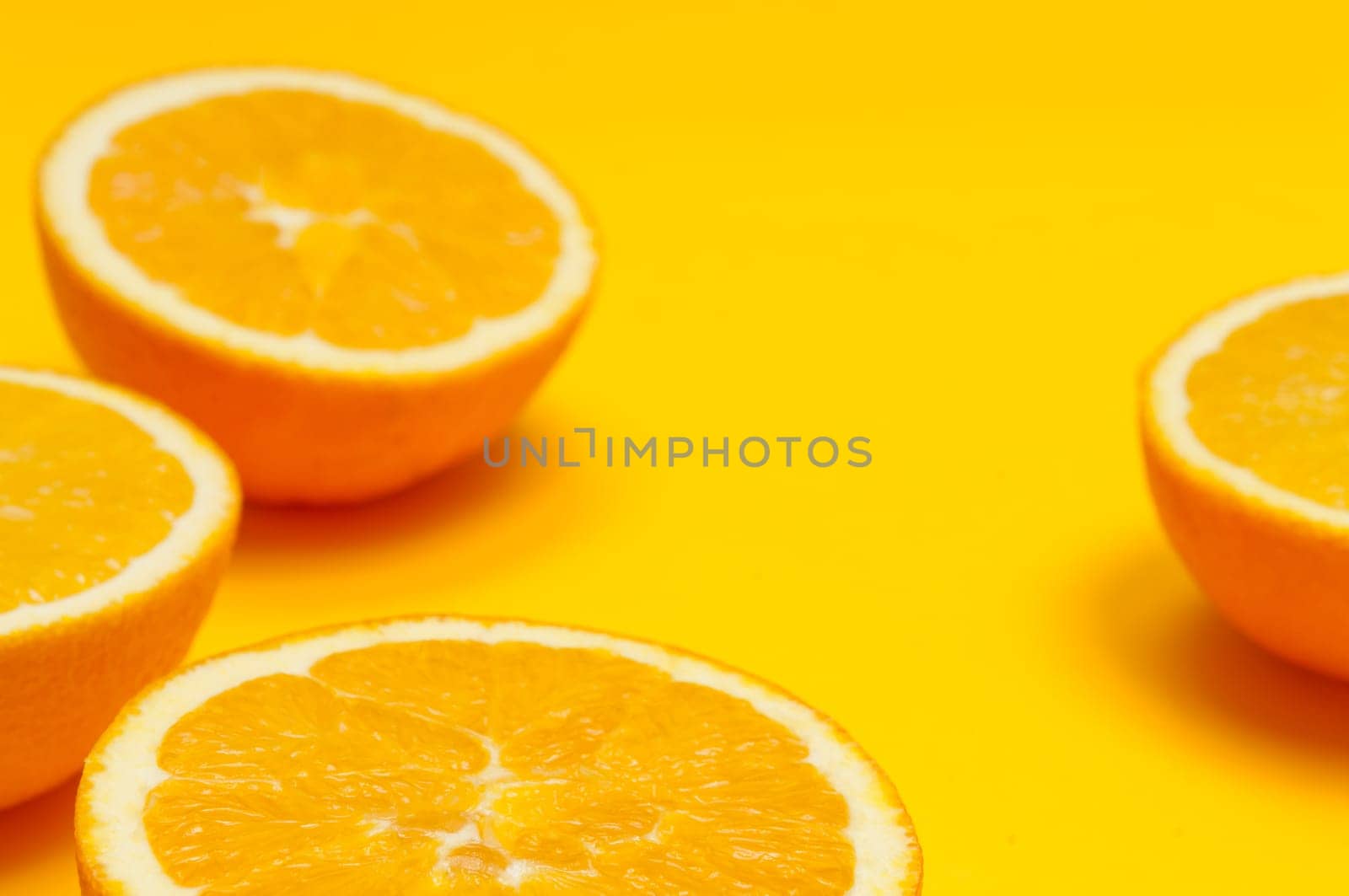 Orange pattern on orange colored background citrus arrangement