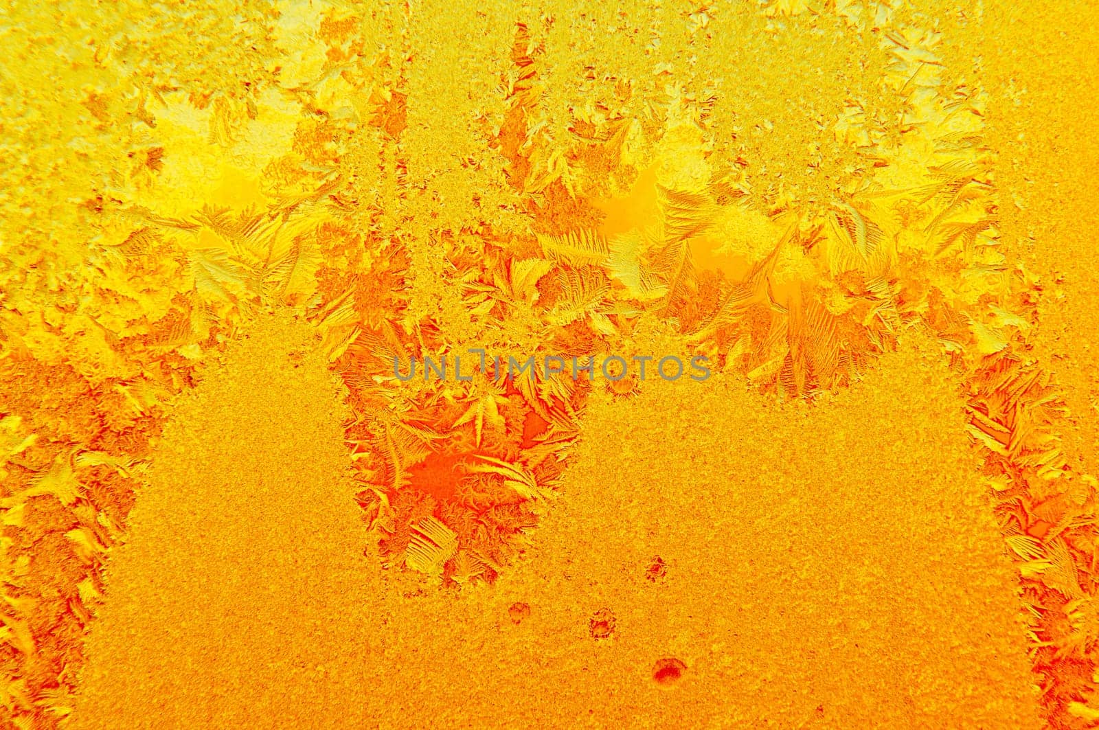 Beautiful frosty glass frostwork and ice flowers on window glass