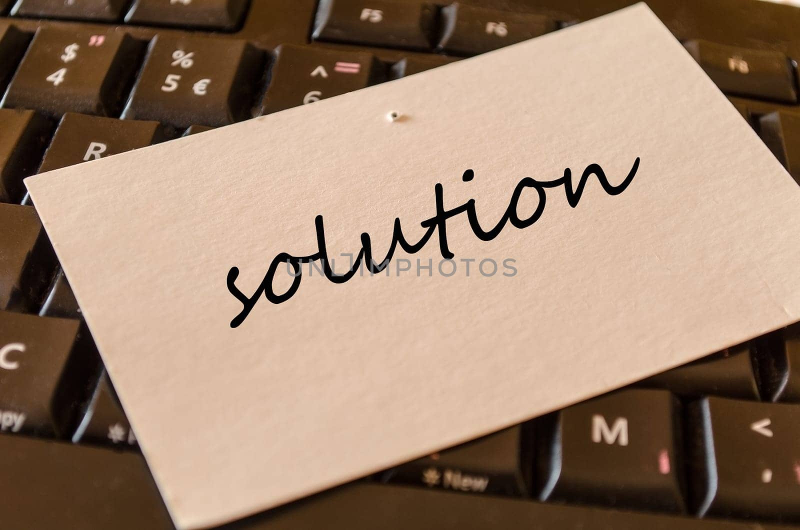 Solution text concept over keyboard background