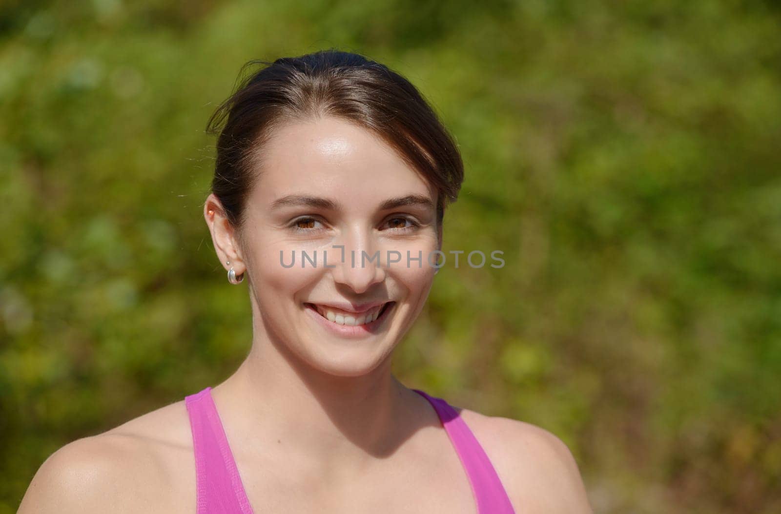 portrait of a young sporty woman in the countryside