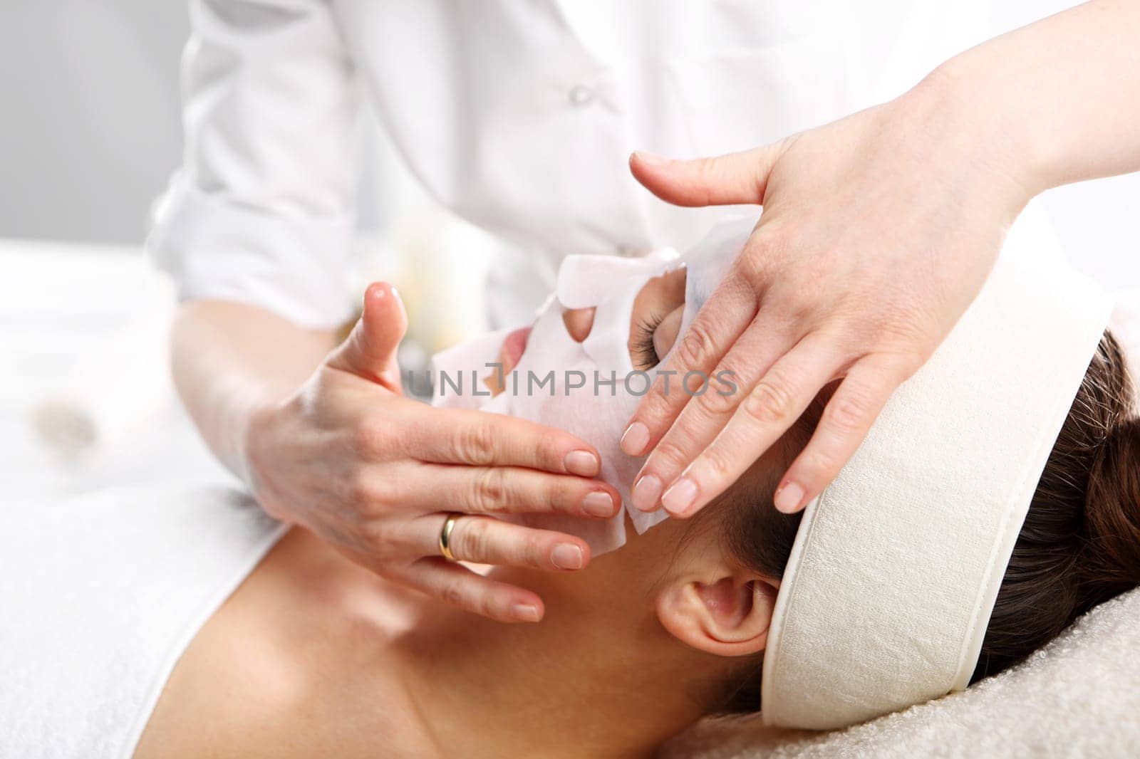 cosmetic cabinet,natural cosmetics. natural spa,a woman in a collagen mask