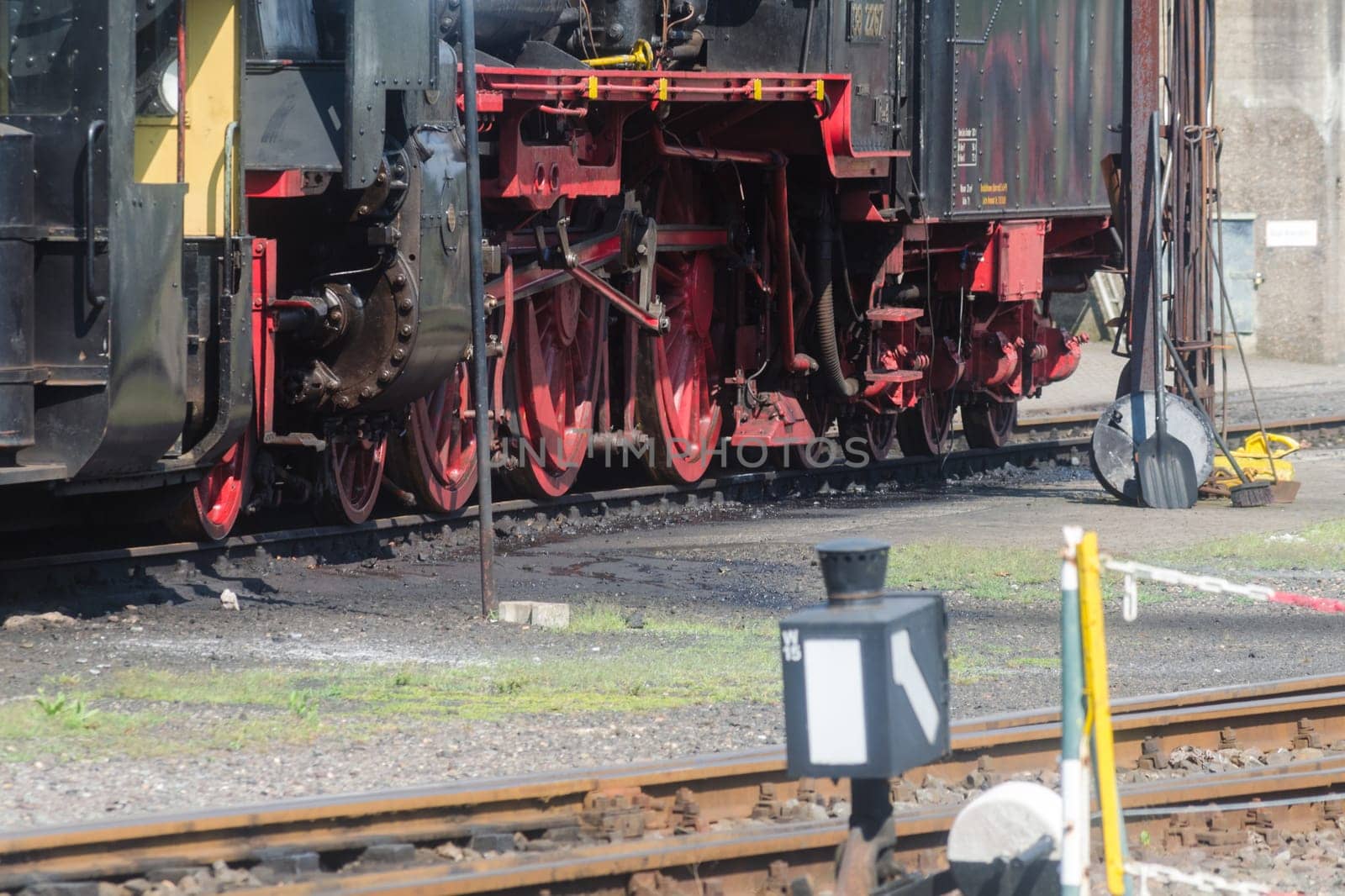 Detail,close-up railway wheels of a vintage train steam locomotive.