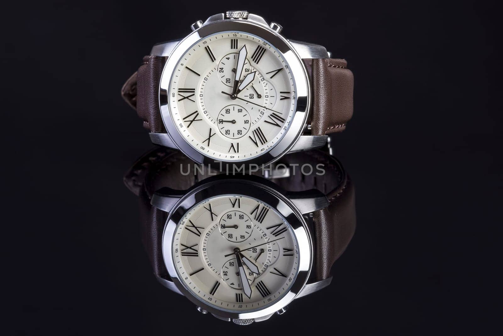 Men's luxury wrist watch on white background.