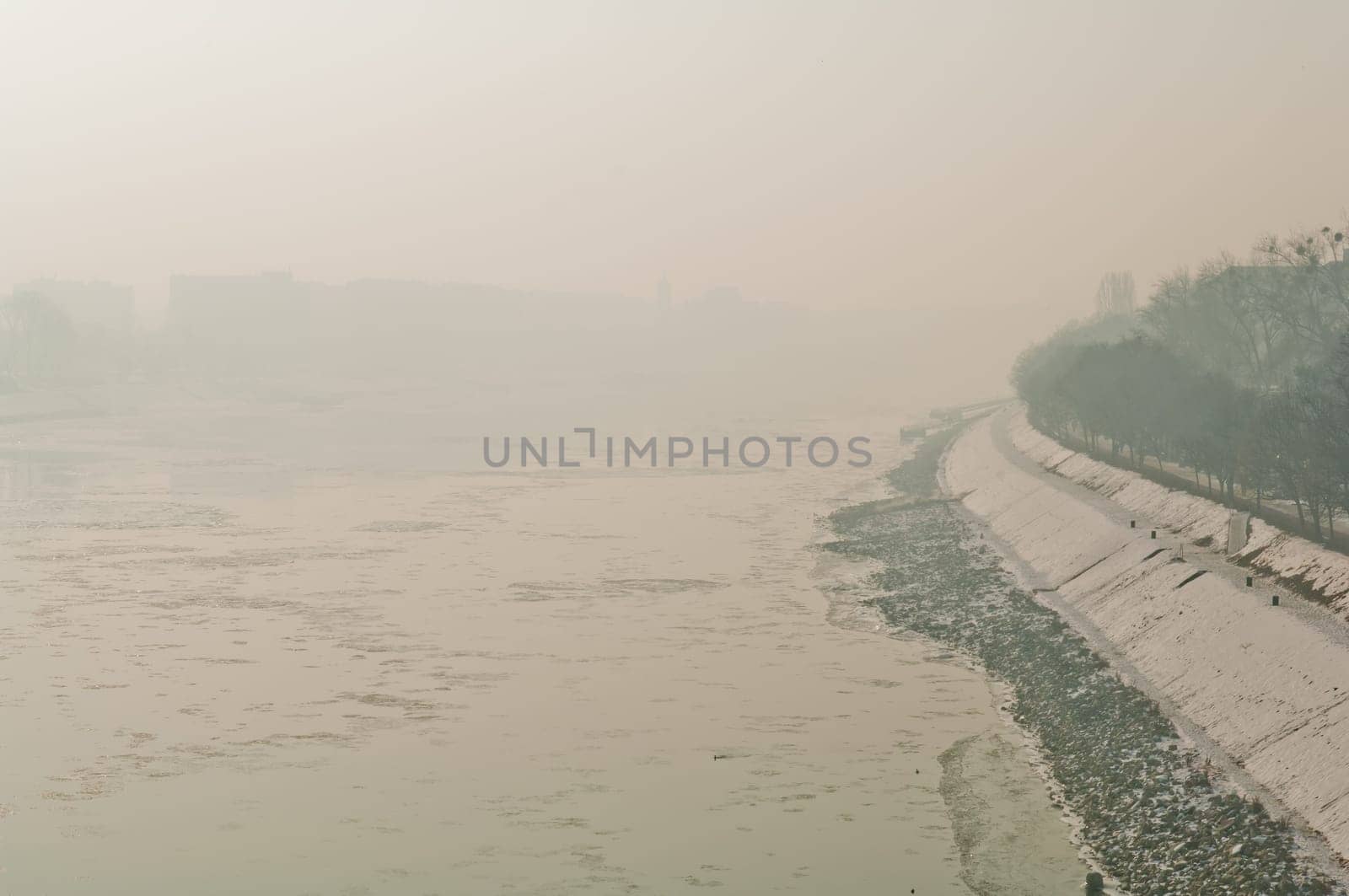 Cold weather, anticyclone favours air pollutants to accumulate and form a dense layer named smog over the city