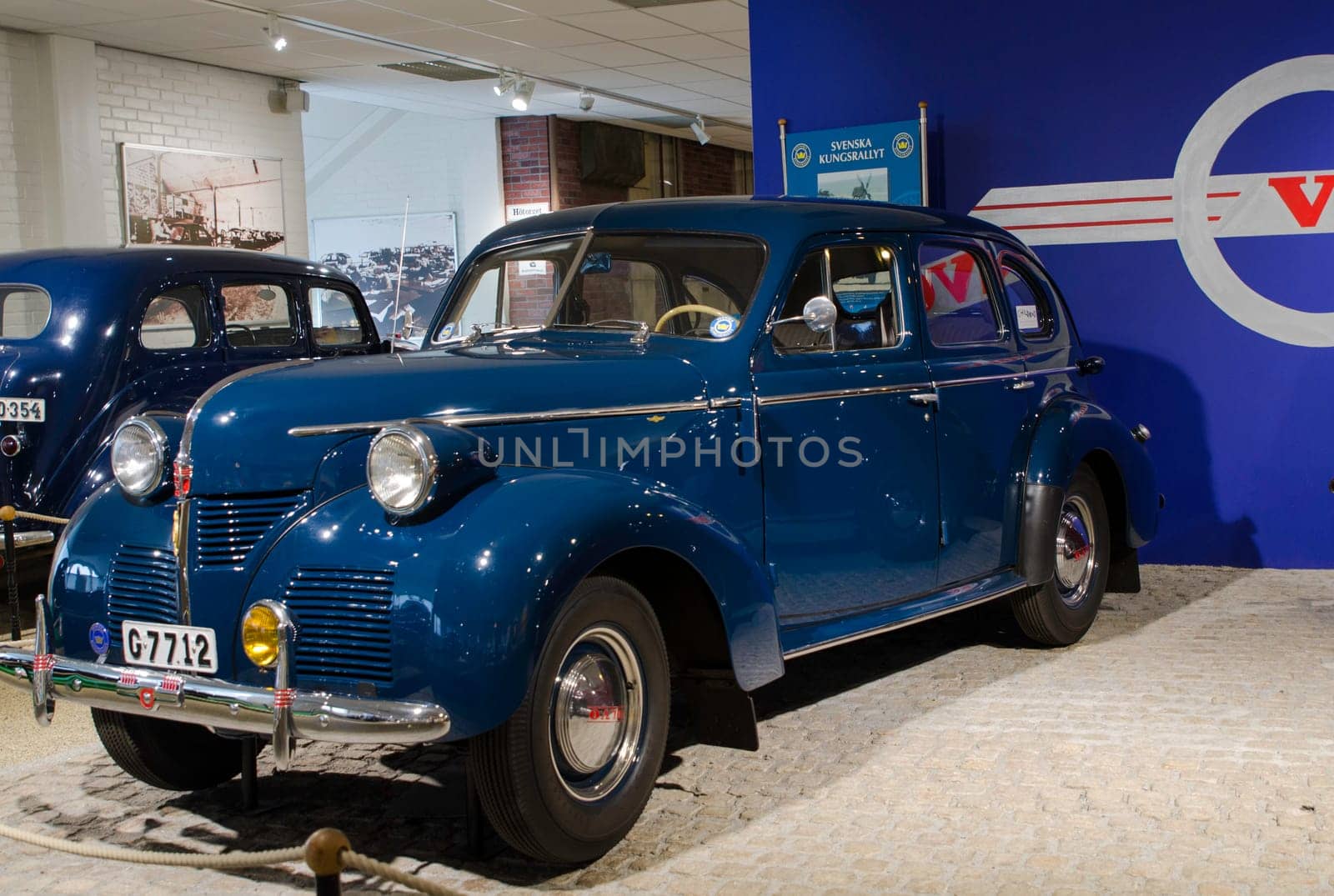 front of one nice blue car from Volvo  model larger