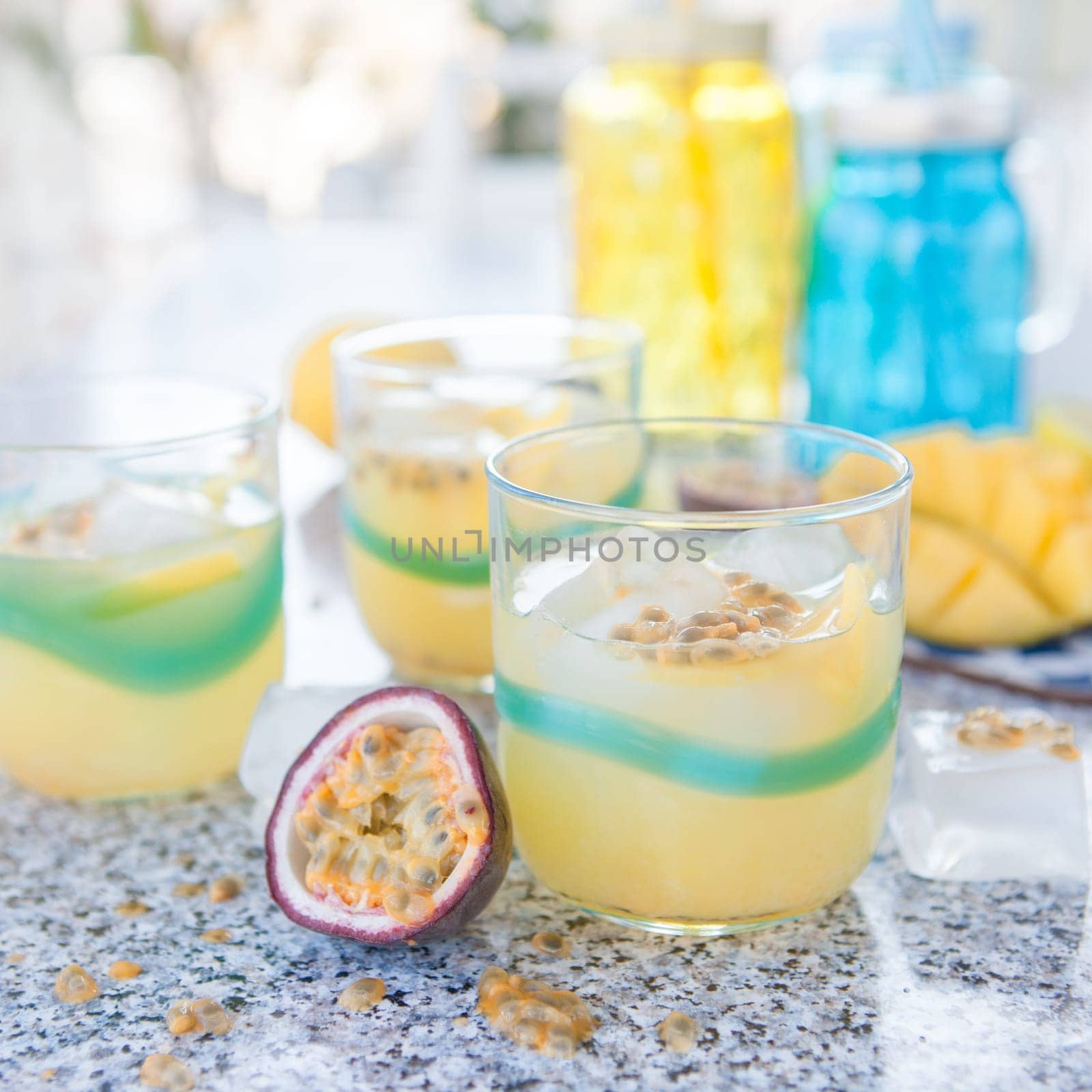 Colourful cocktail with passion fruit and mango