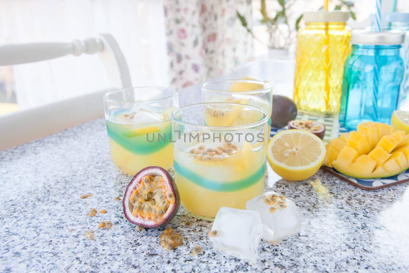 Colourful cocktail with passion fruit and mango
