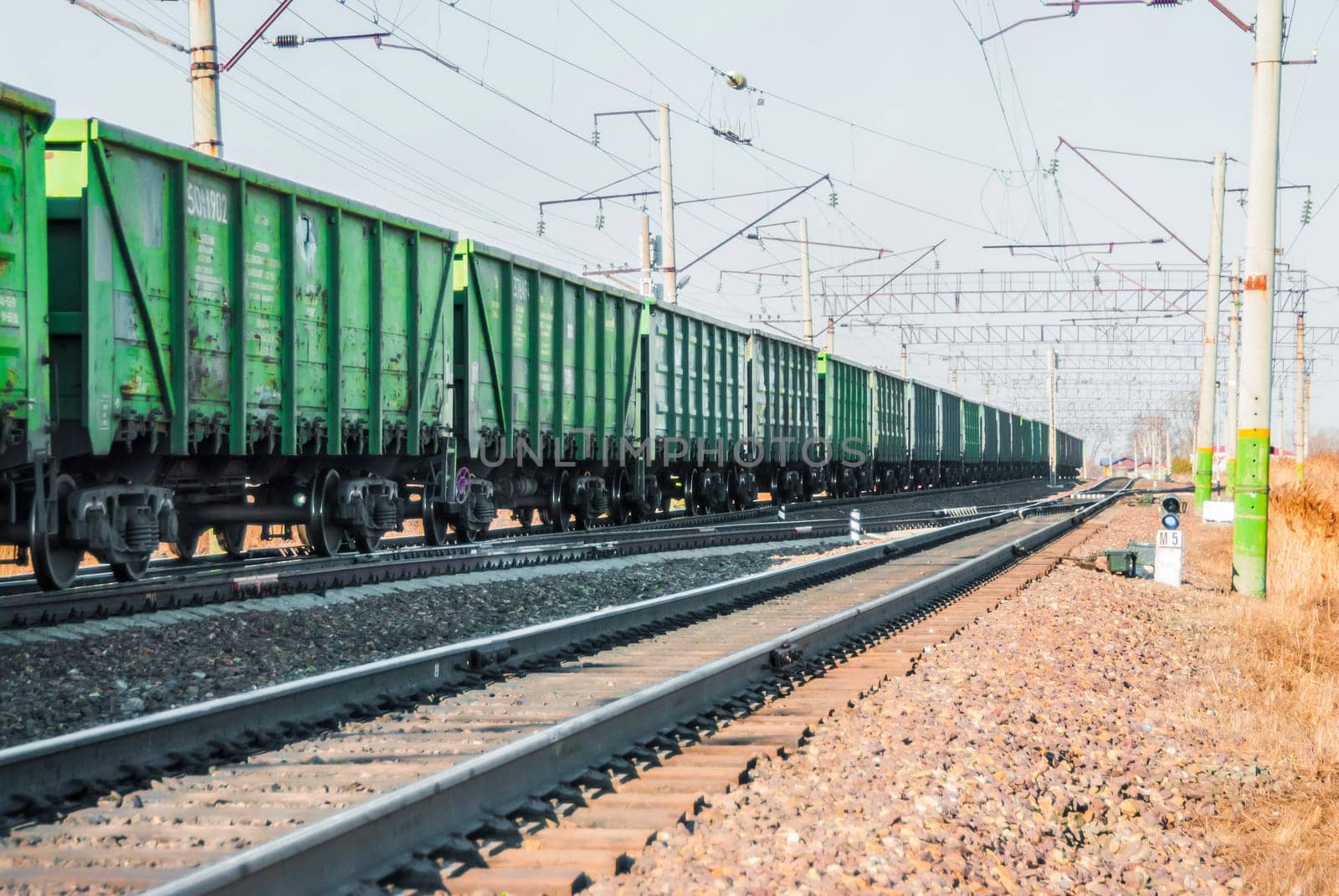 The railroad and the passing train on the railway tanks