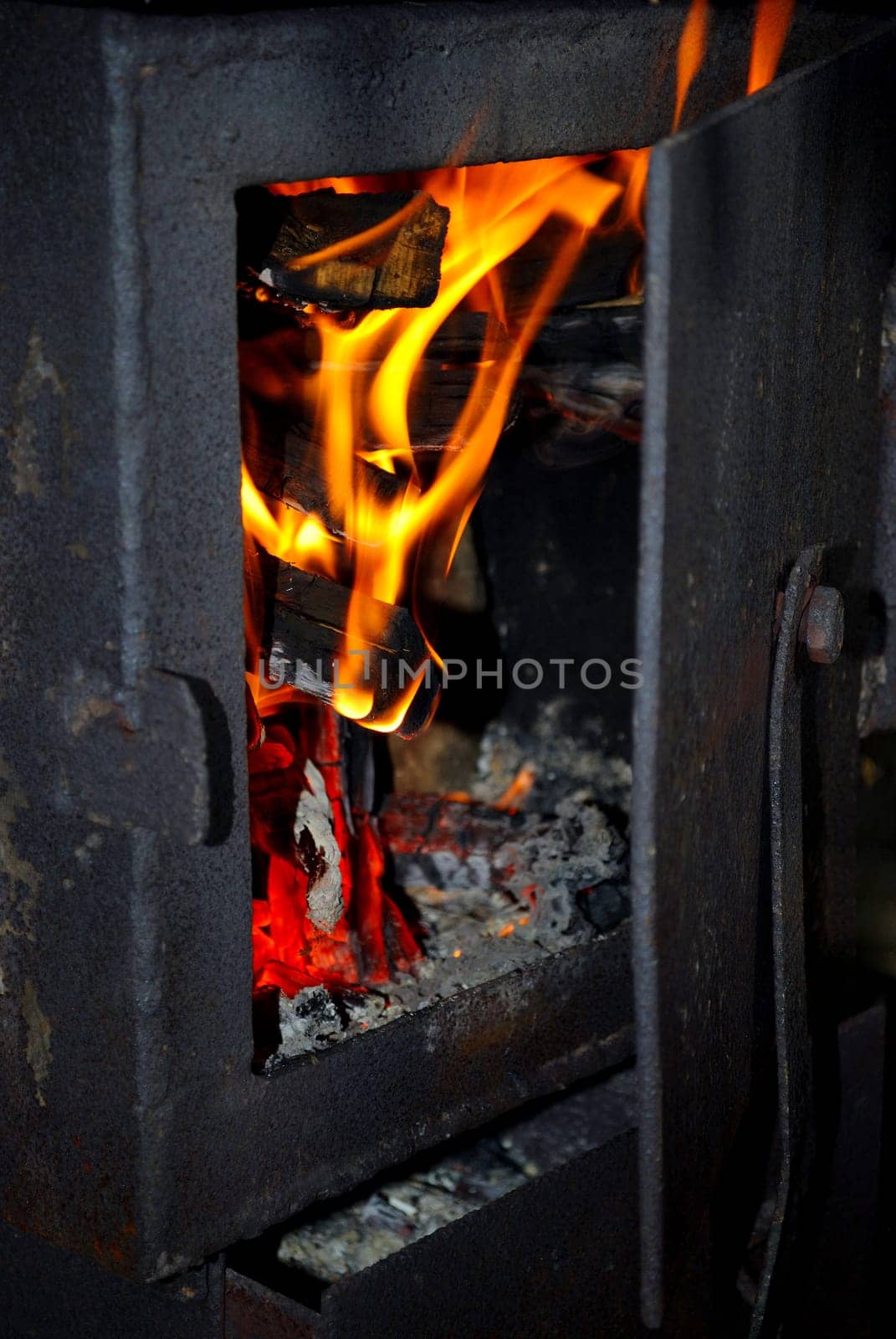 Burning fire wood in the brick furnace