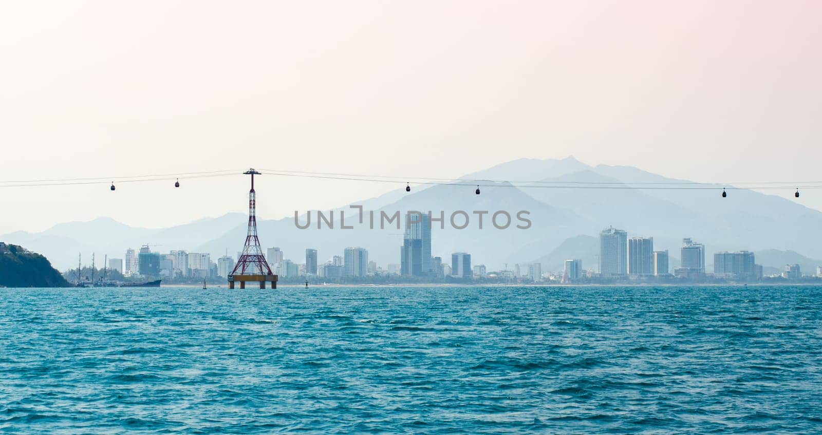 Vietnamese city in the morning mist on the horizon