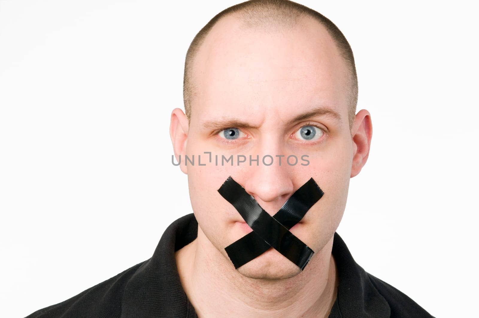 Head portrait of a young man with a cross-glued mouth against a white background