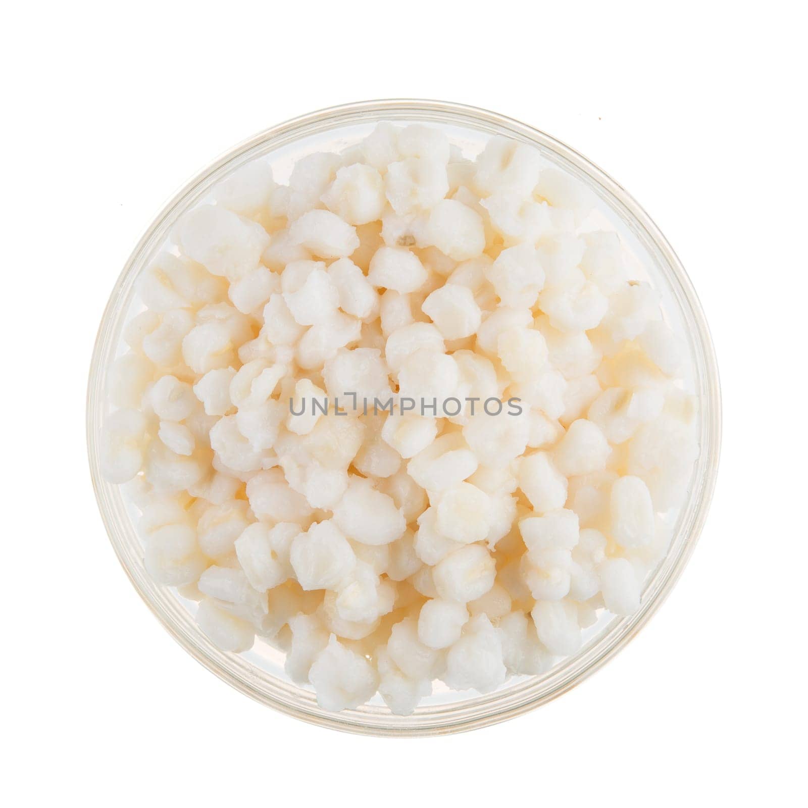 Isolated bowl of white raw hominy