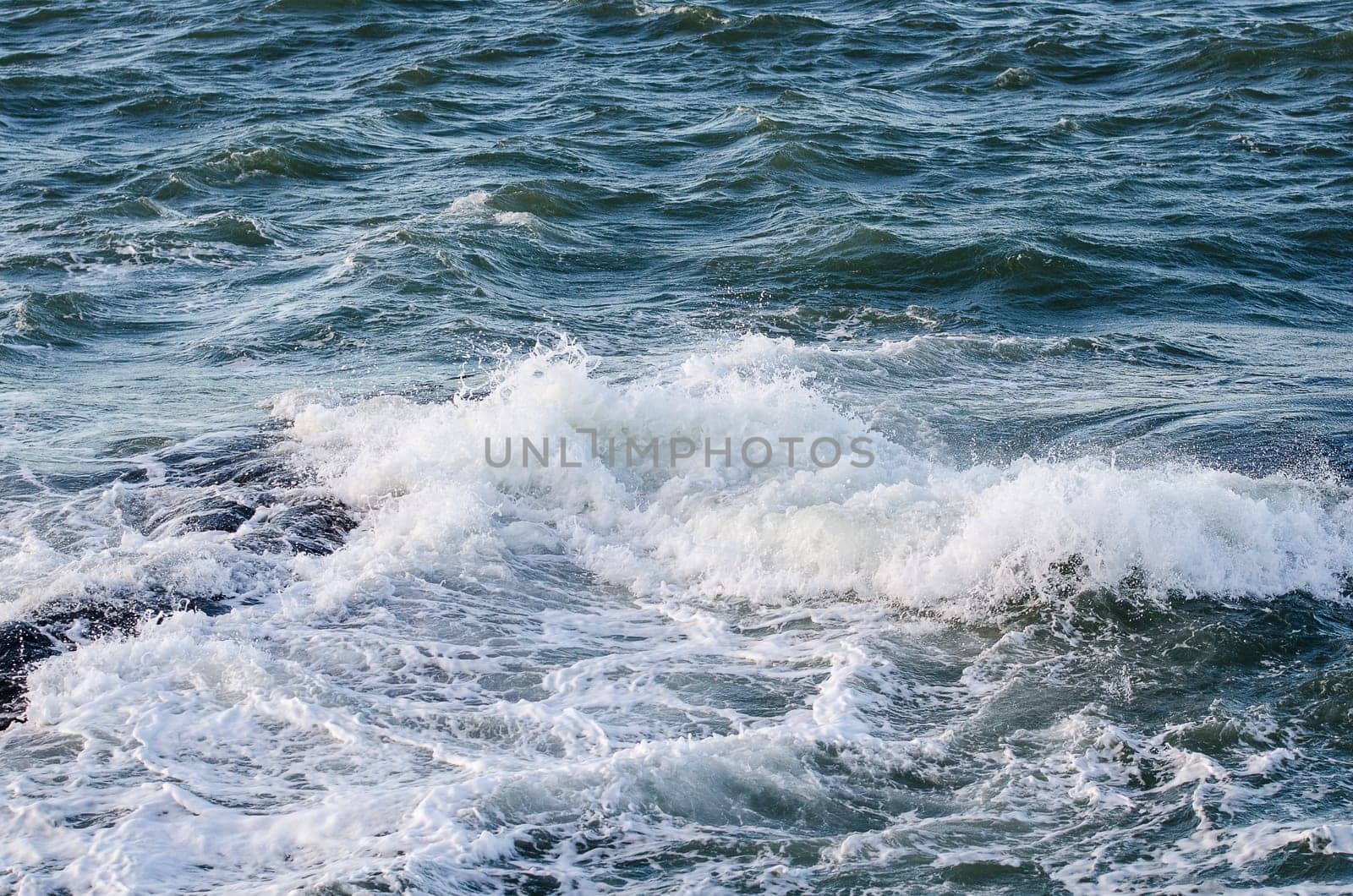 the water spash to the rock and begins to be foam