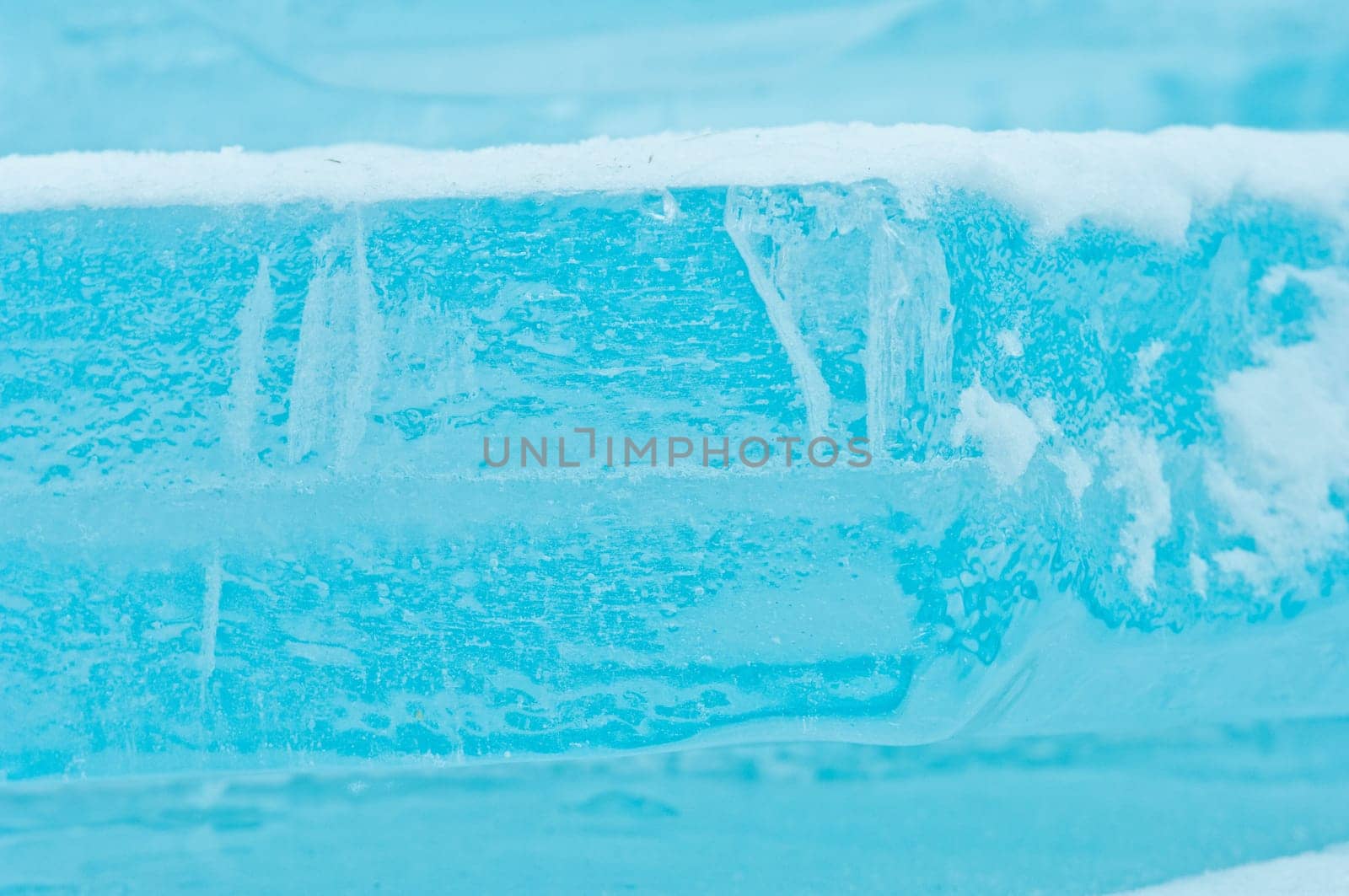 Winter scene at a frozen lake with ice-pack and other ice formations