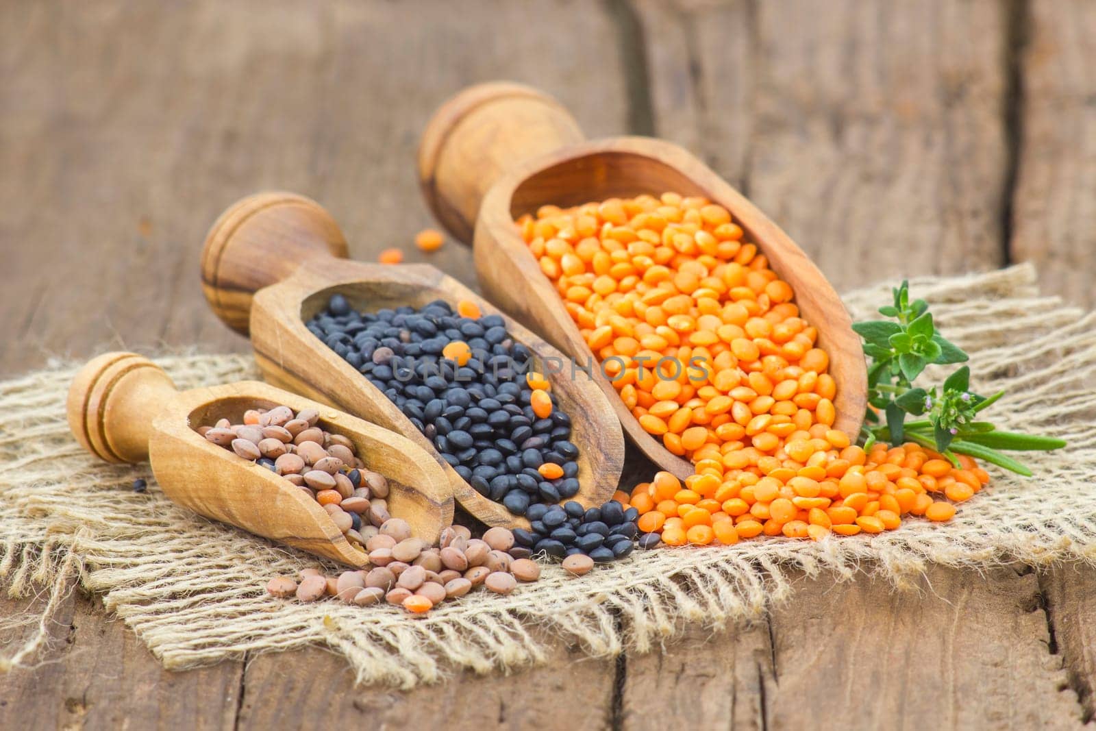 wooden scoops with lentils