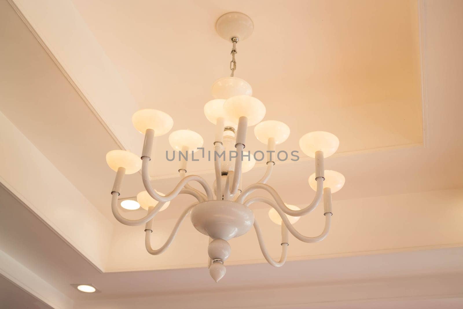 Chandelier in warm vintage room style, stock photo