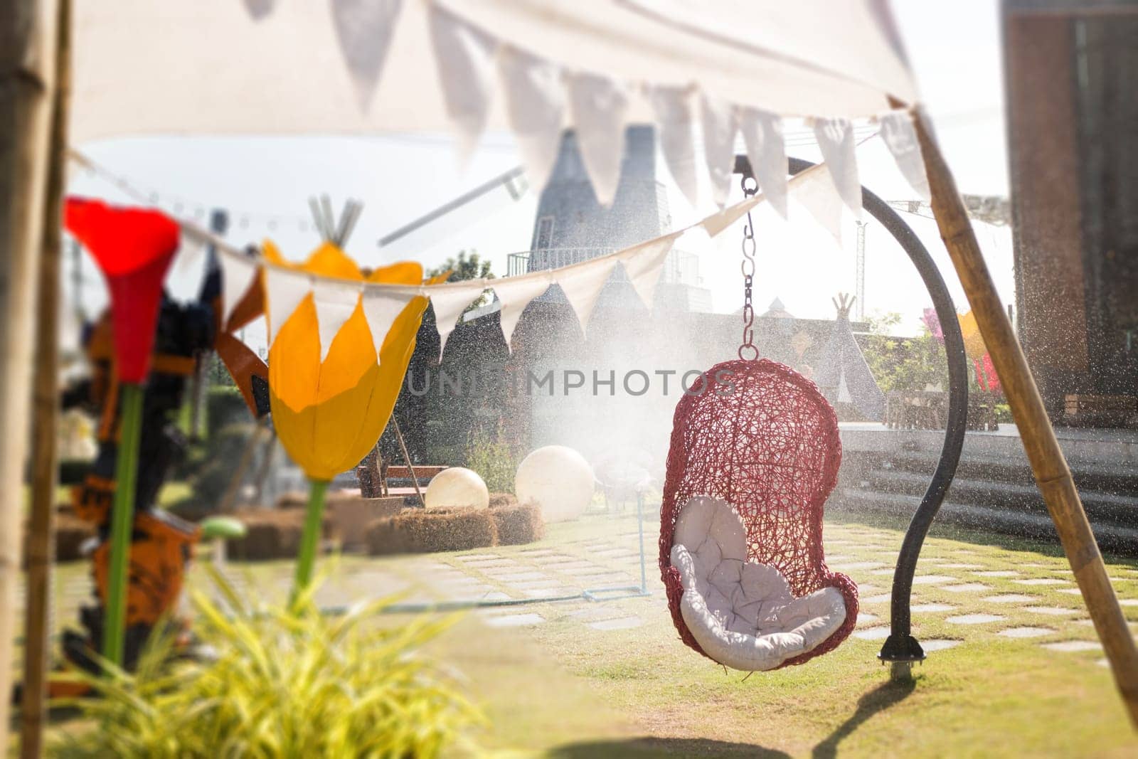 Rattan outdoor garden cradle chair, stock photo