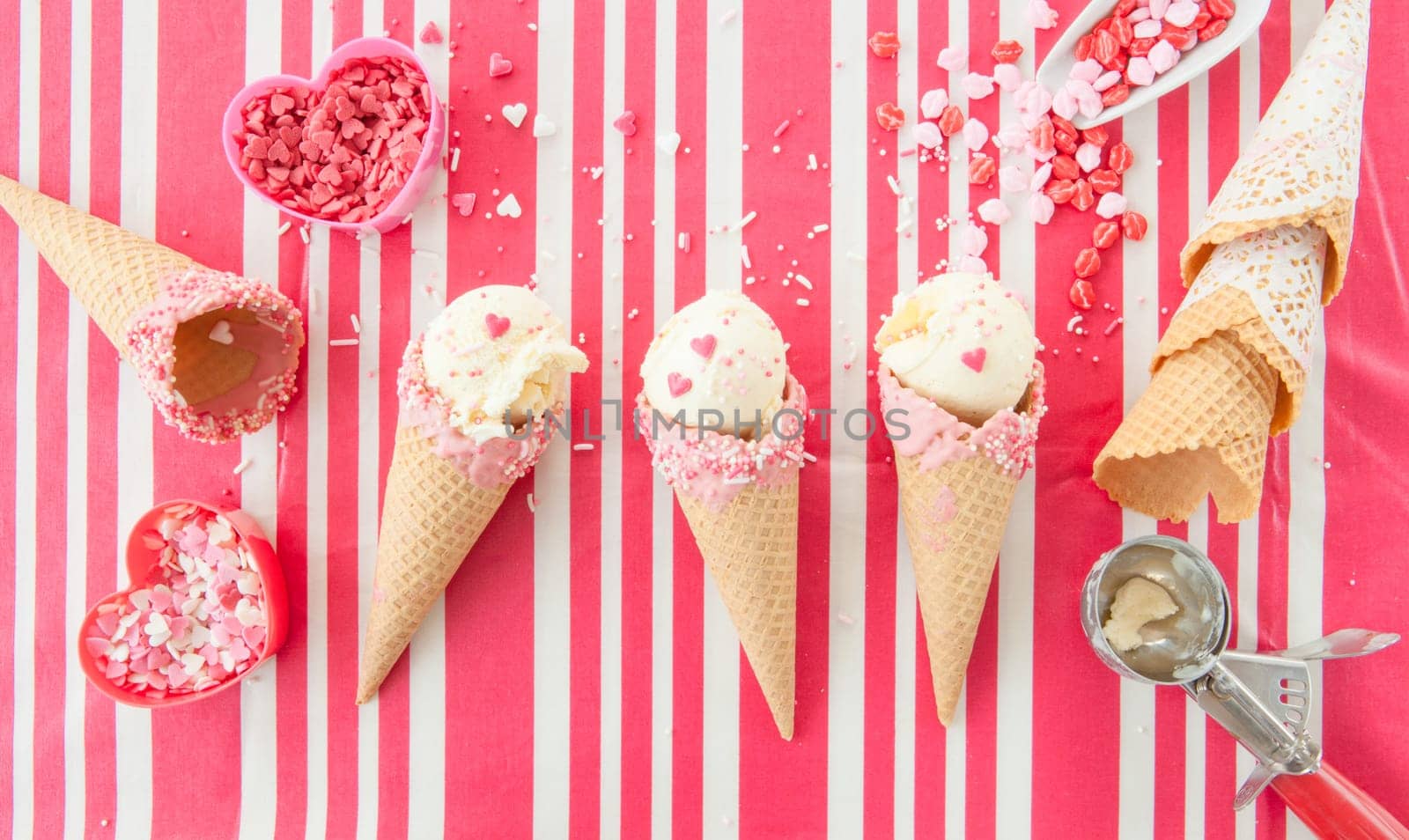 Vanilla ice cream in waffle tug with sugar sprinkles