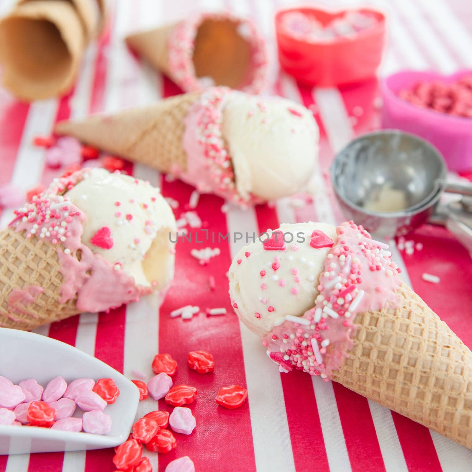 Vanilla ice cream in waffle tug with sugar sprinkles