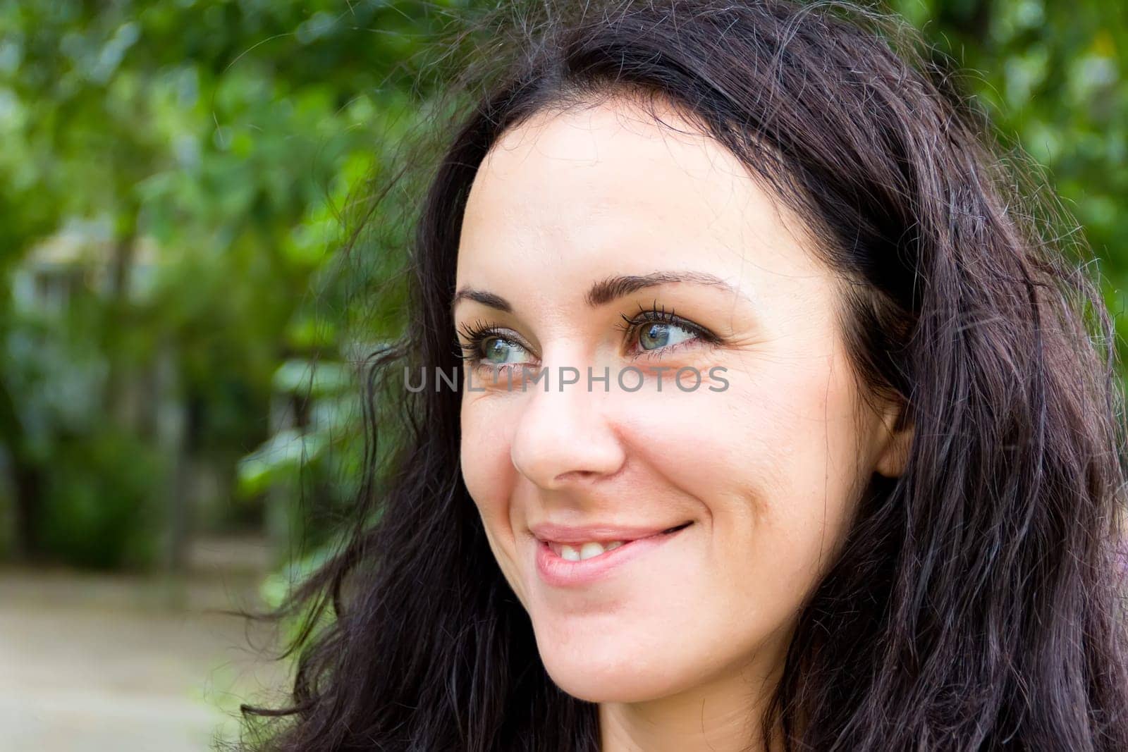 Portrait of European beautiful woman with black hair