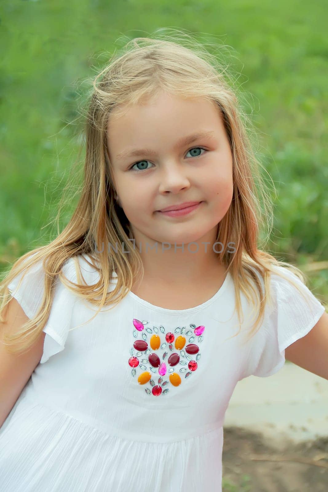 Portrait of beautiful girl with blue eyes