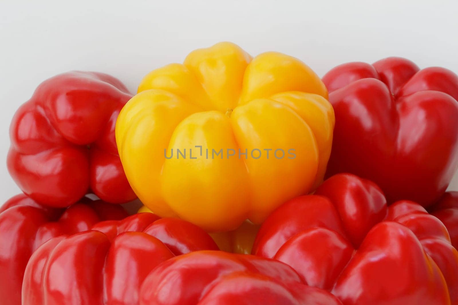 Image of red and yellow raw pepper