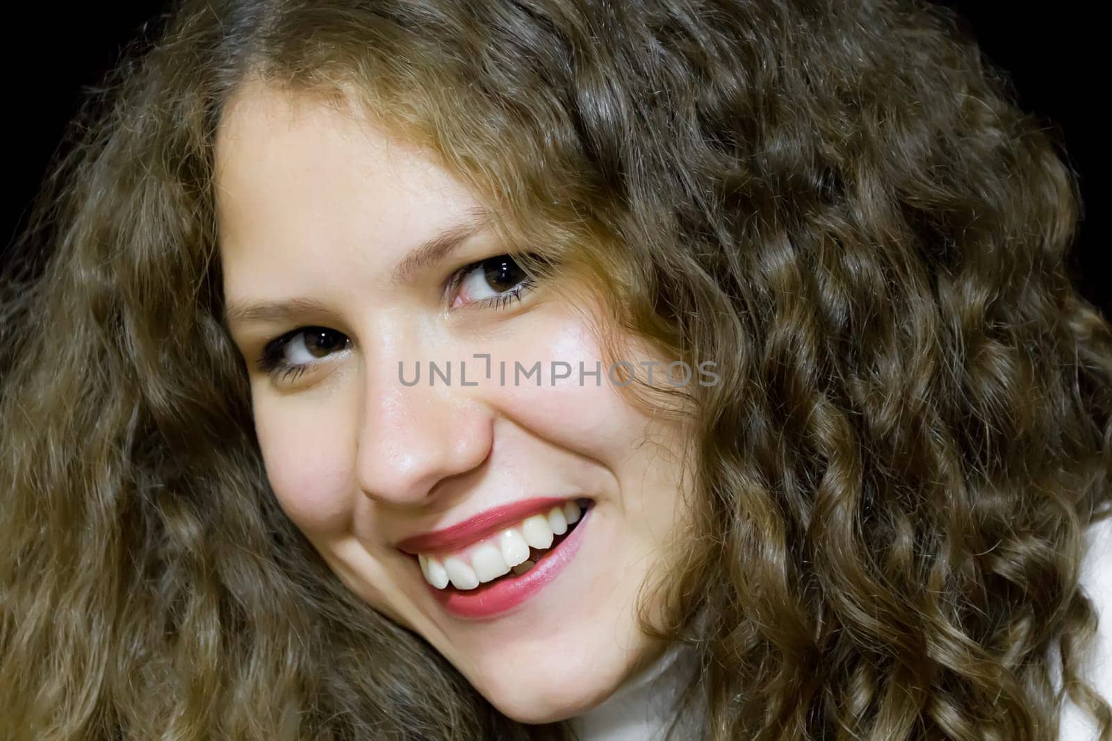 Image of young woman with long brown hair