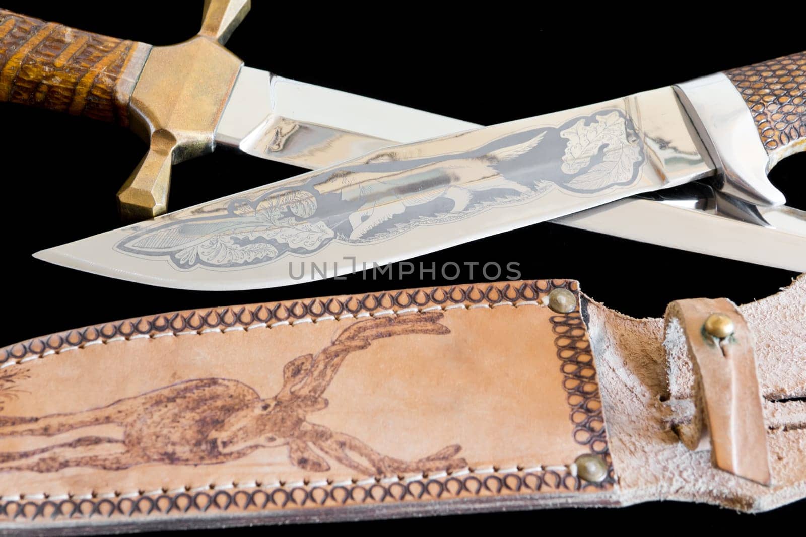 Photo of cold weapon on black background