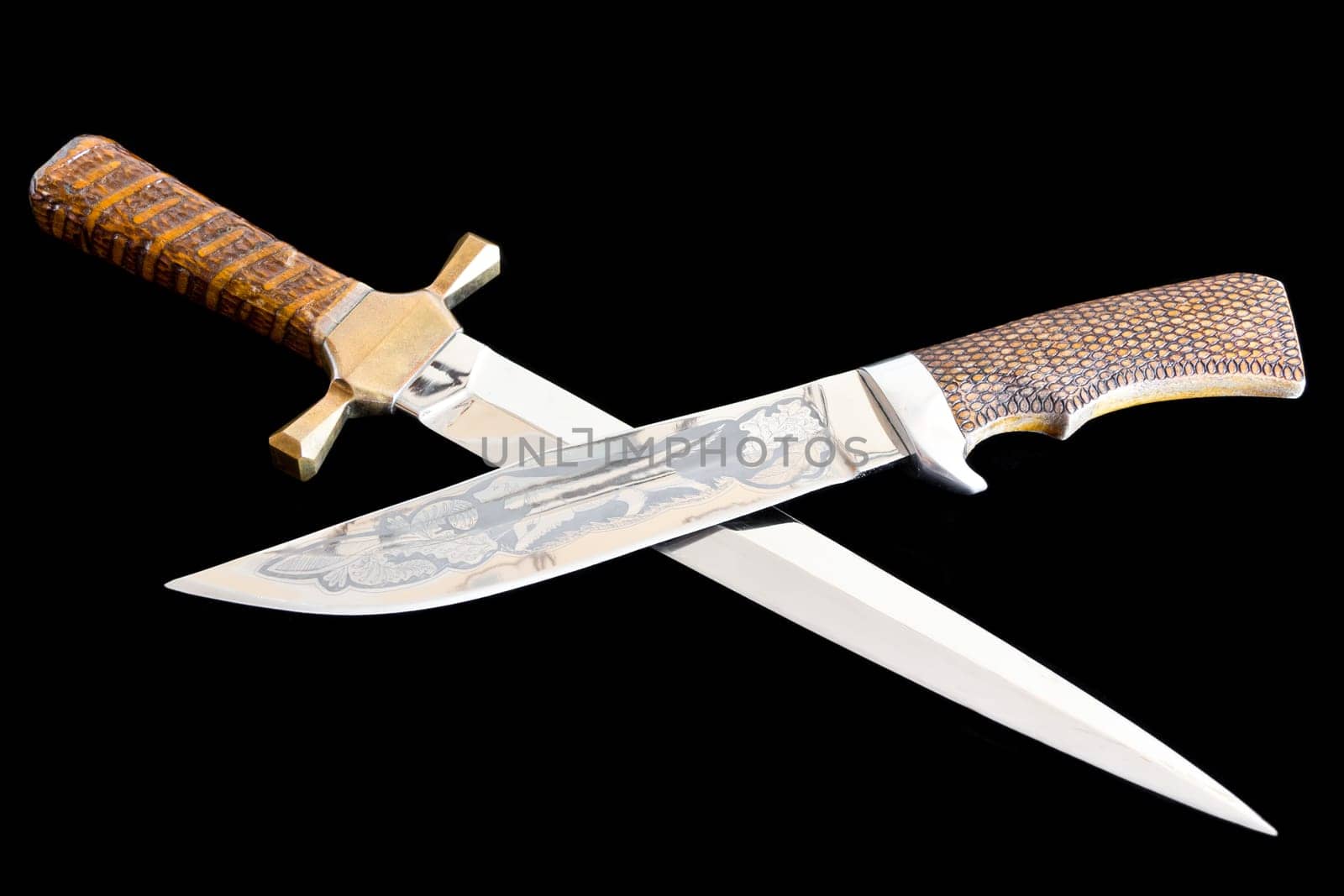 Photo of cold weapon on black background