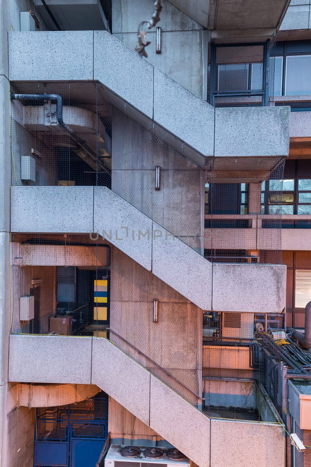 front facing the emergency stairs creating a pattern of concrete