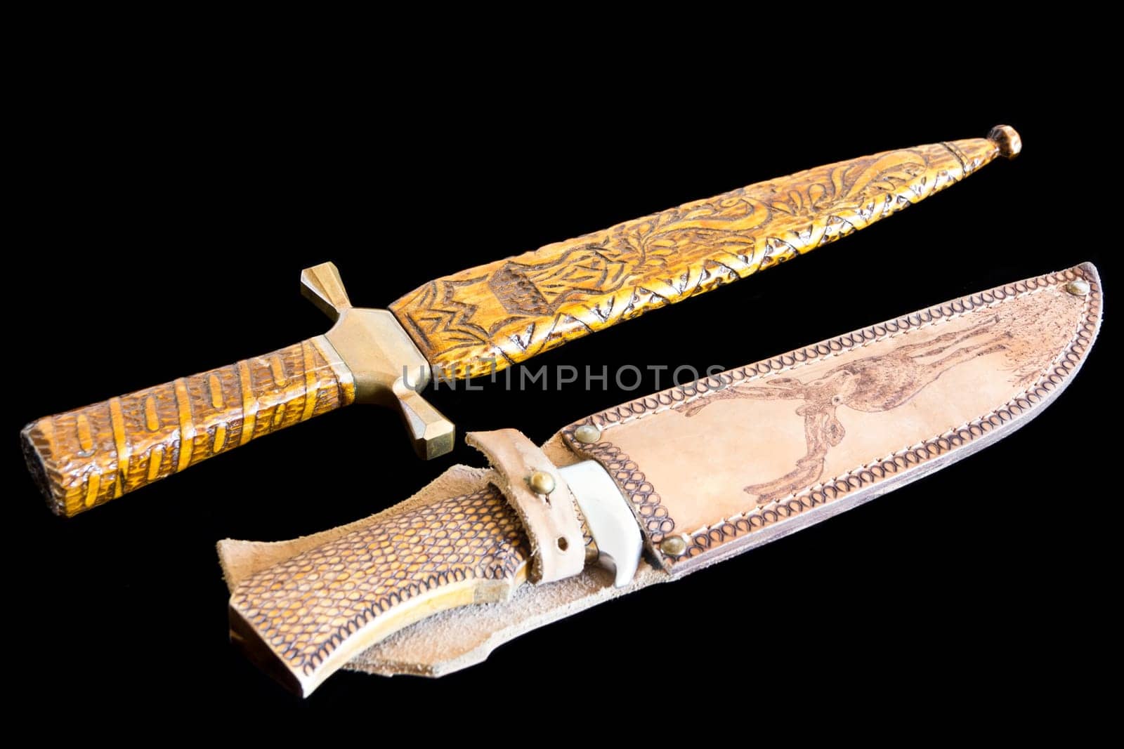 Photo of cold weapon on black background