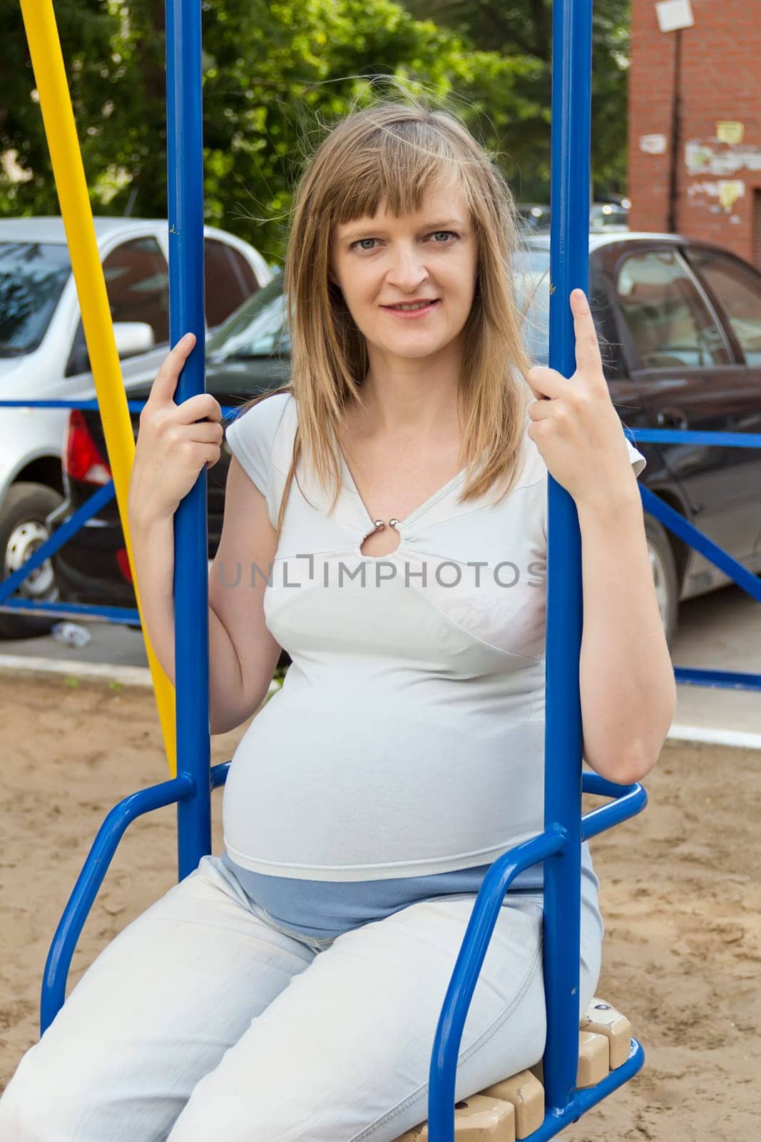 Image of pregnant woman in blue clothes