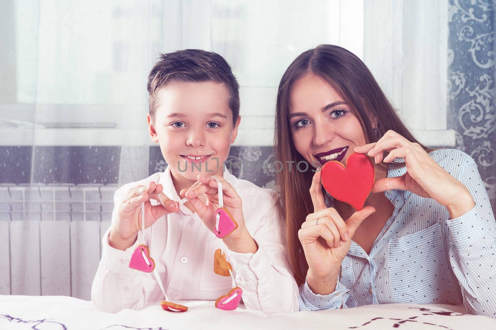 Happy Valentines Day, Mother day or Woman 8 march Day. Young boy spend time with his mum and celebrate it
