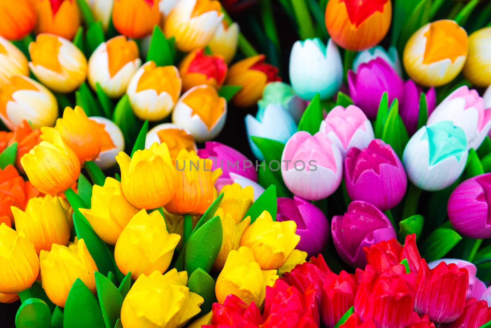 Wooden tulips souvenirs painted in vivid colours in Amsterdam, the Netherlands