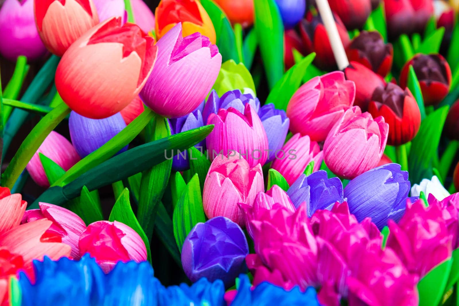 Wooden tulips souvenirs painted in vivid colours in Amsterdam, the Netherlands