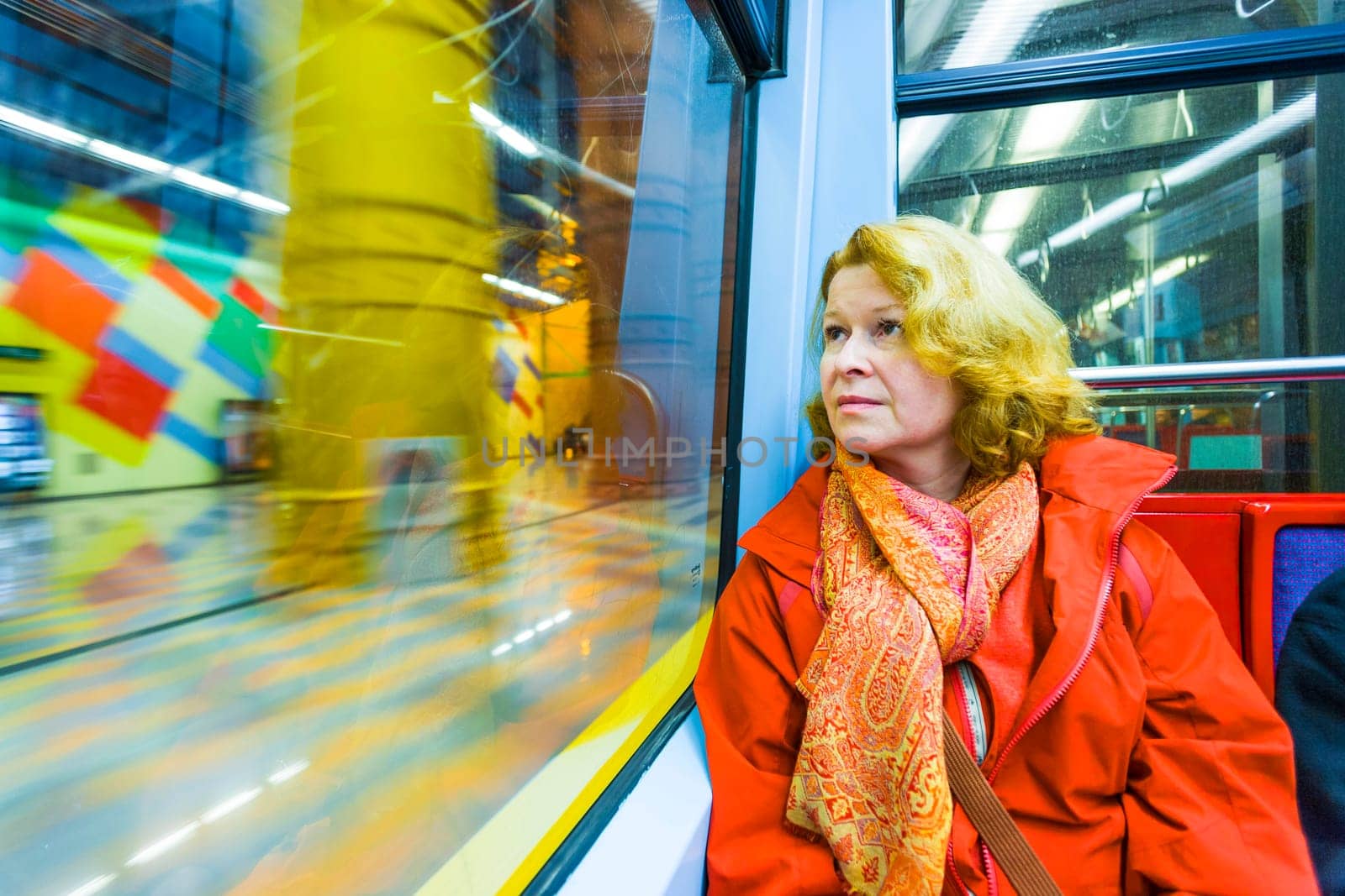 woman in subway by night