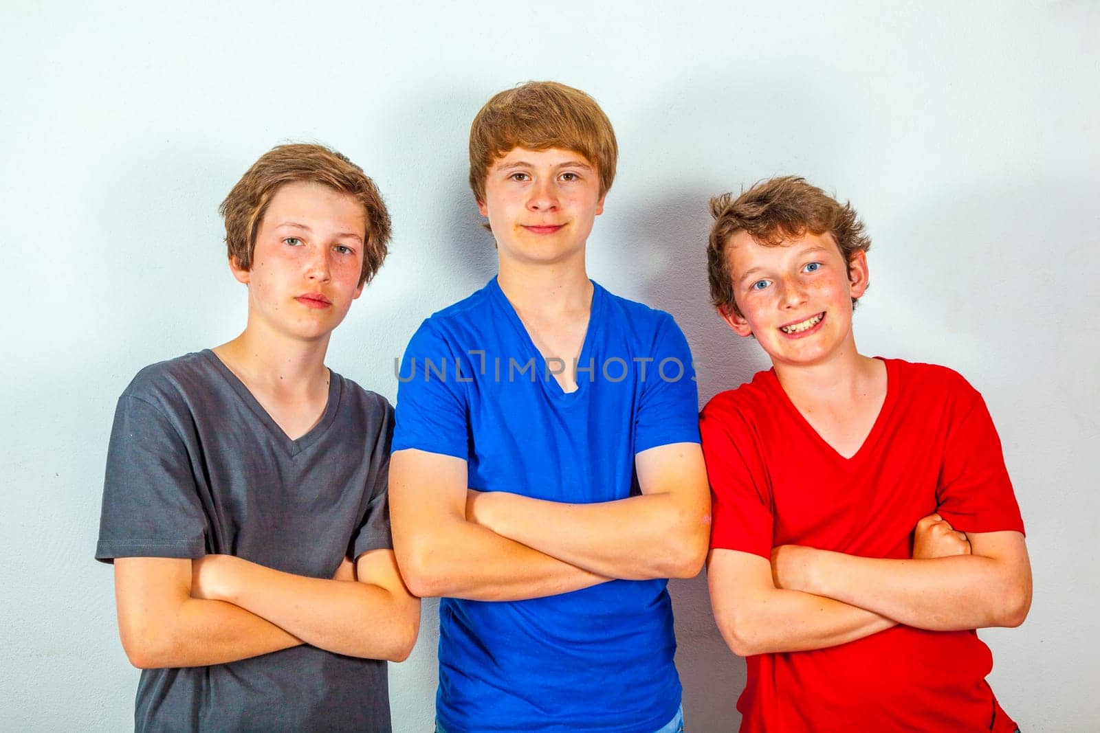 three happy joyful friends enjoy life