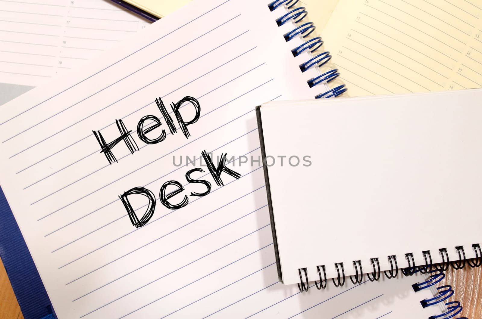 Help desk text concept write on notebook