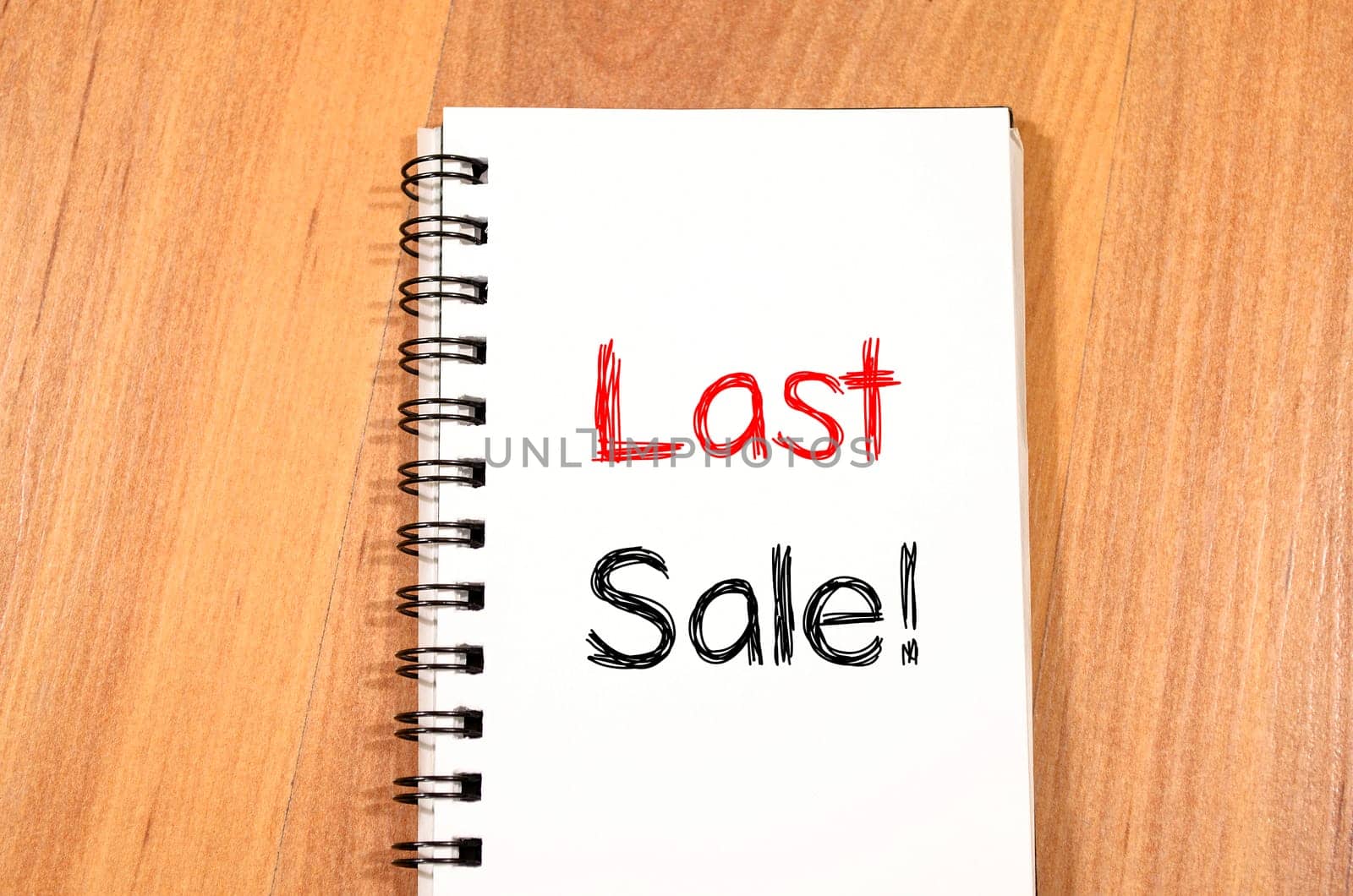 Last sale text concept write on notebook