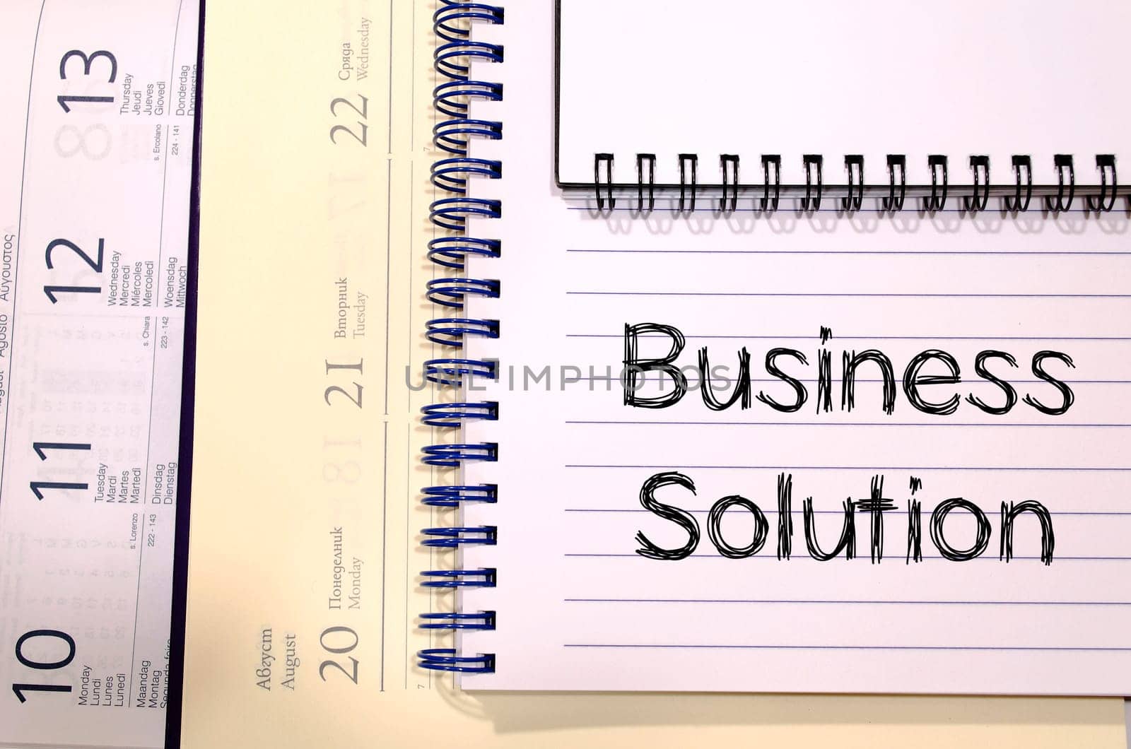 Business solution text concept write on notebook