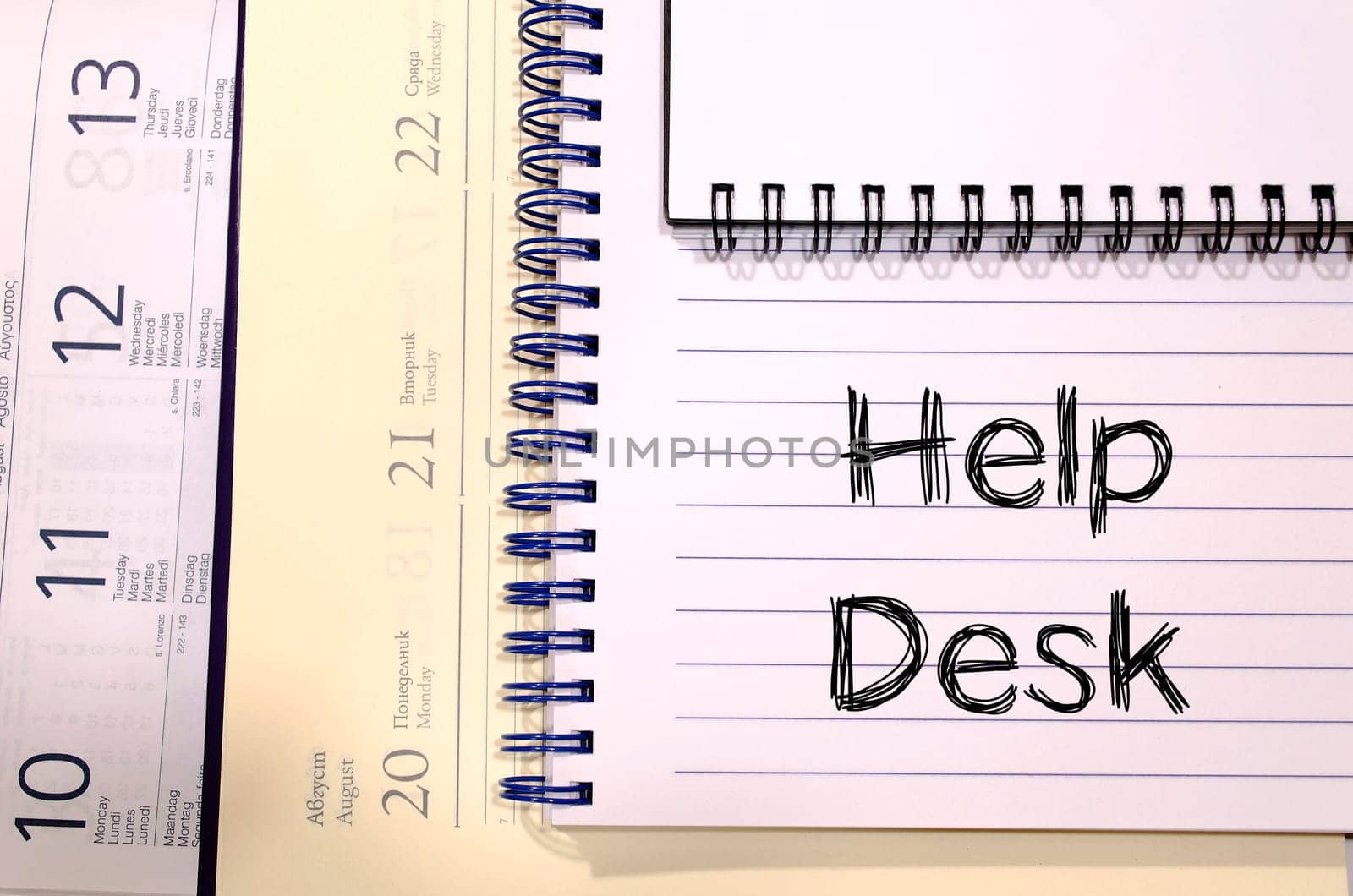 Help desk text concept write on notebook