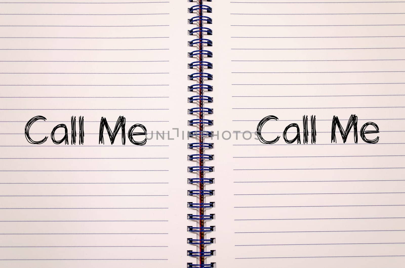 Call me text concept write on notebook