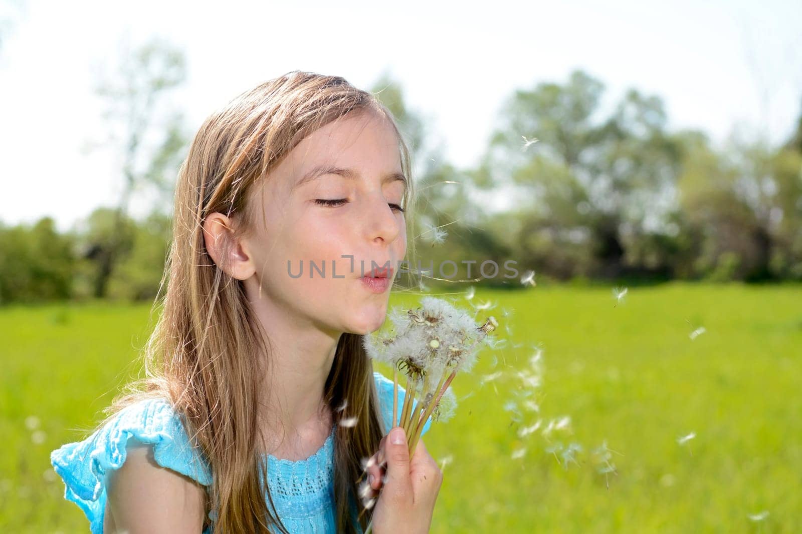 Girls with dandelions