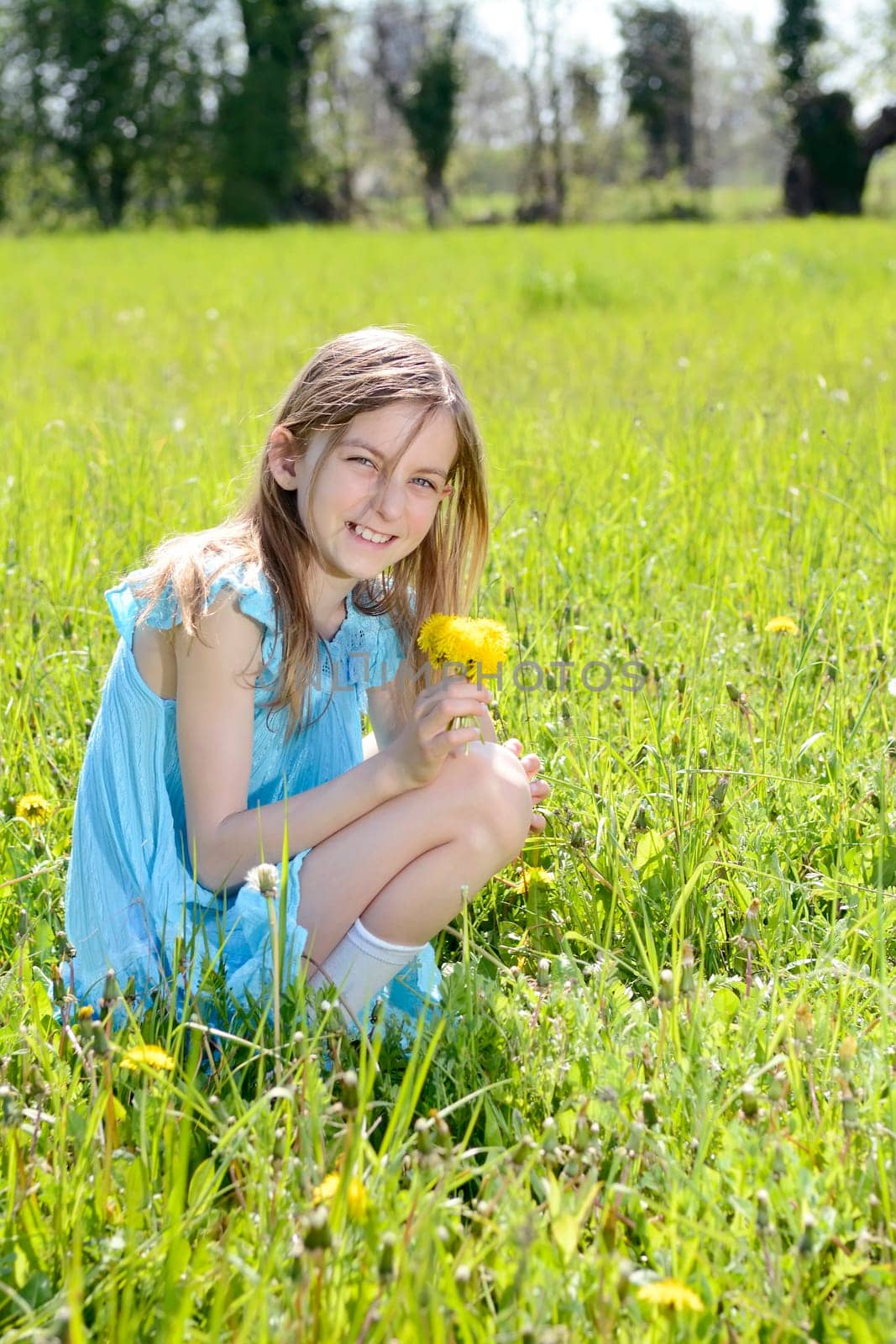 Girls with dandelions