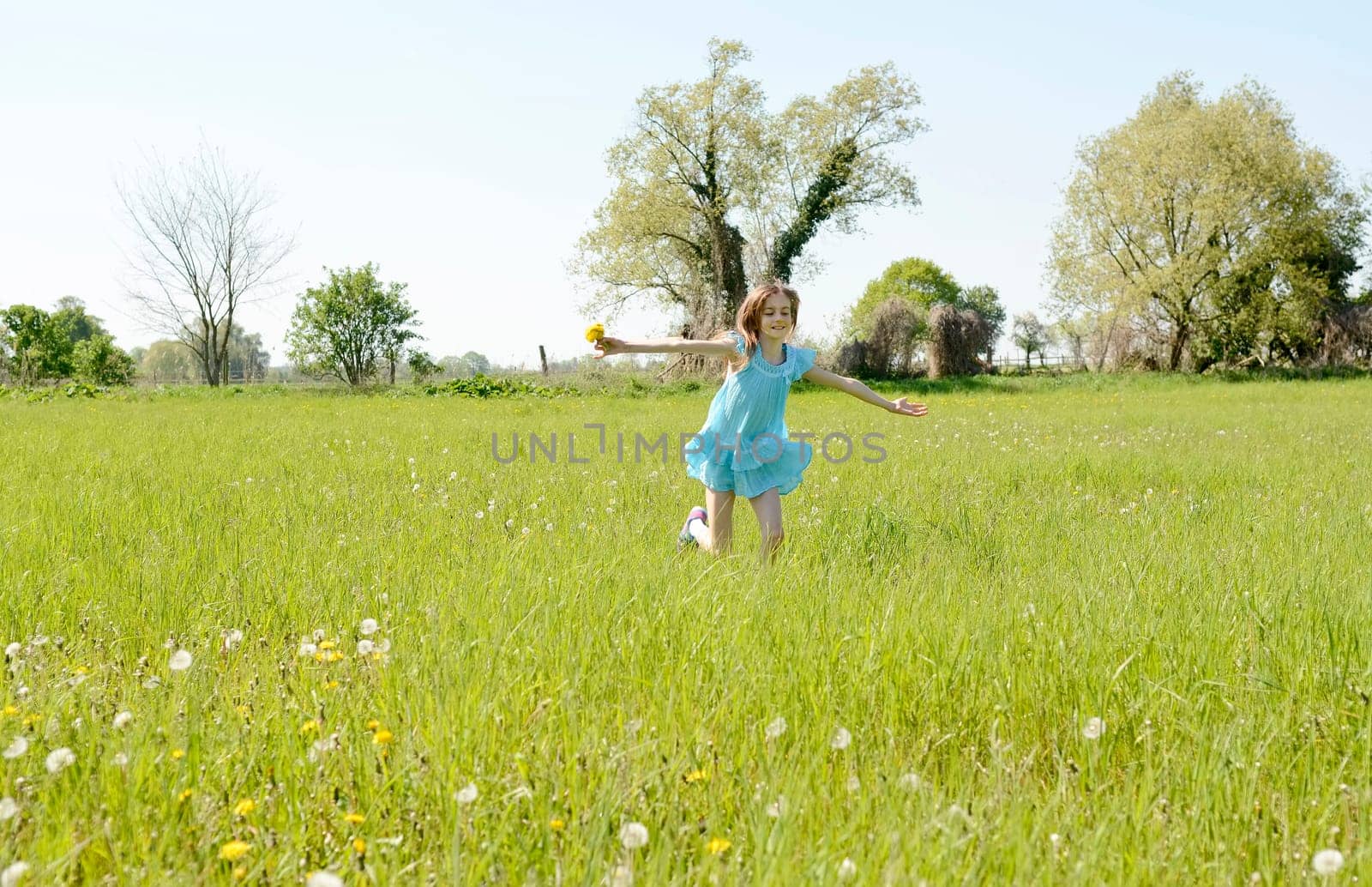 Girls with dandelions
