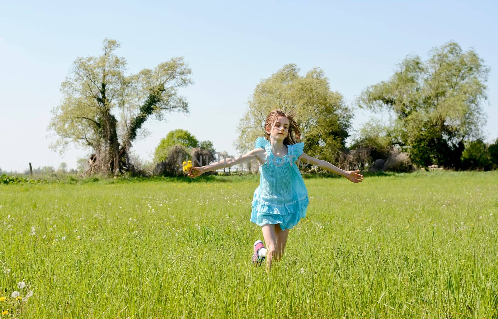 Girls with dandelions