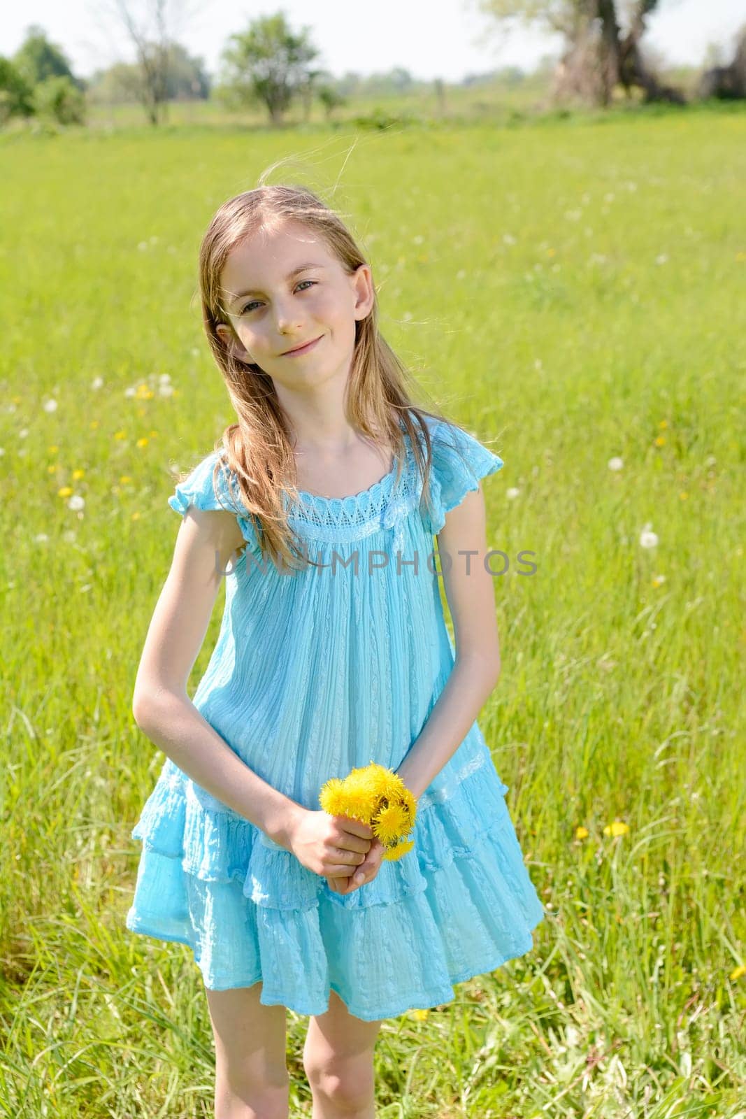 Girls with dandelions
