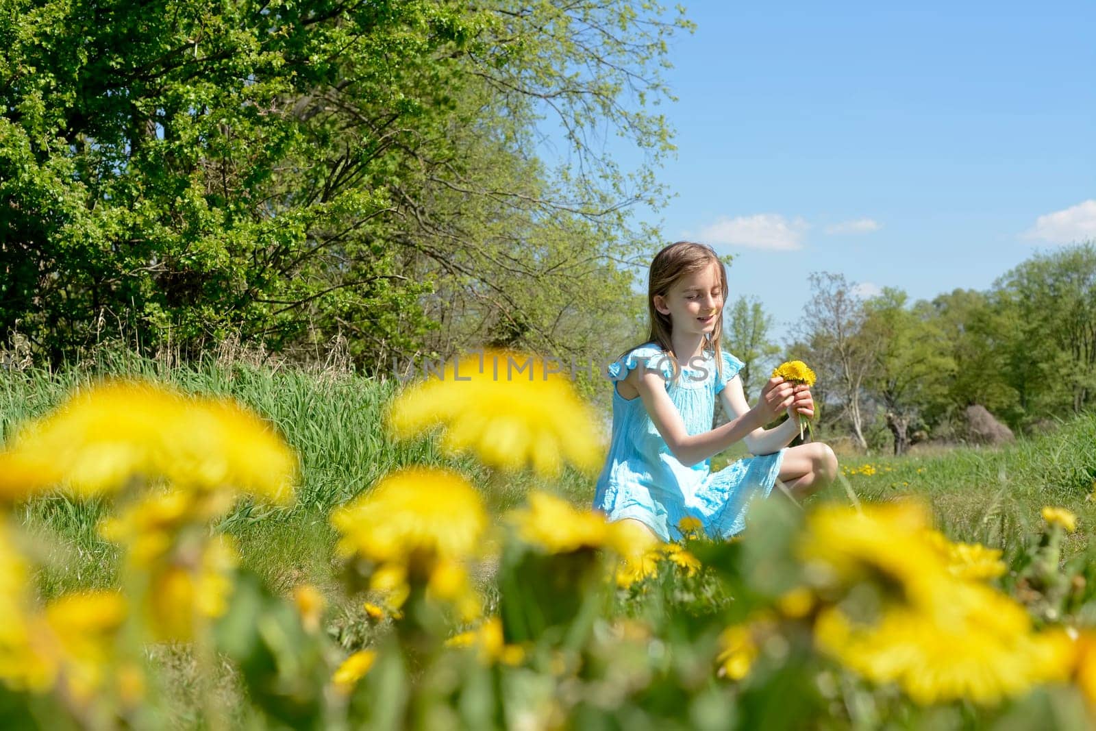 Girls with dandelions
