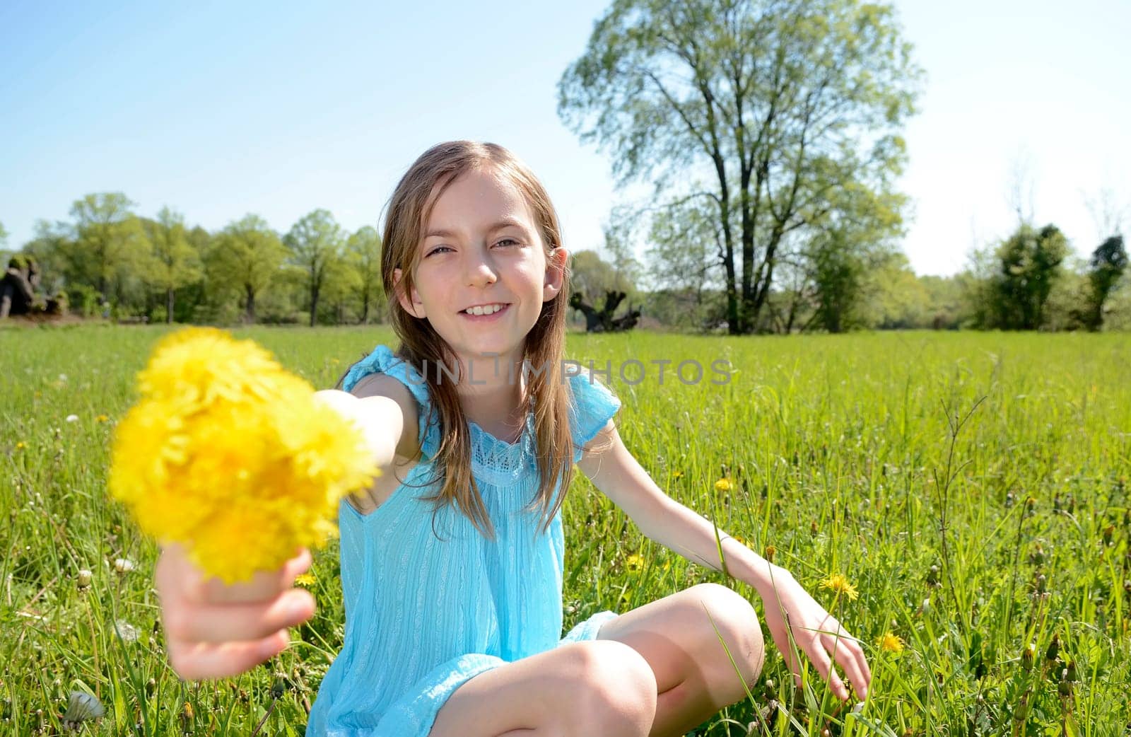 Girls with dandelions