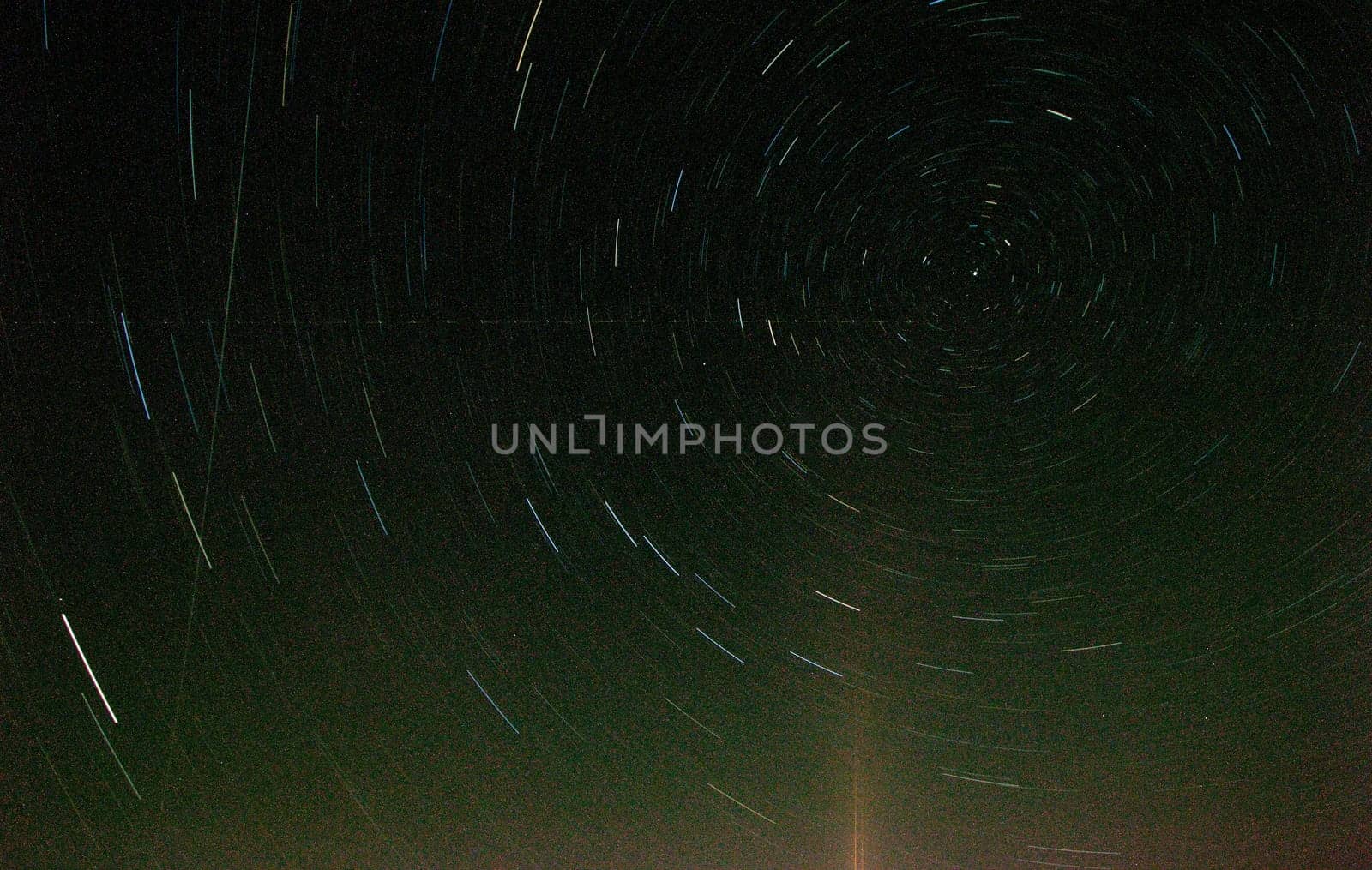 long exposure of star trails with retro effect high grain